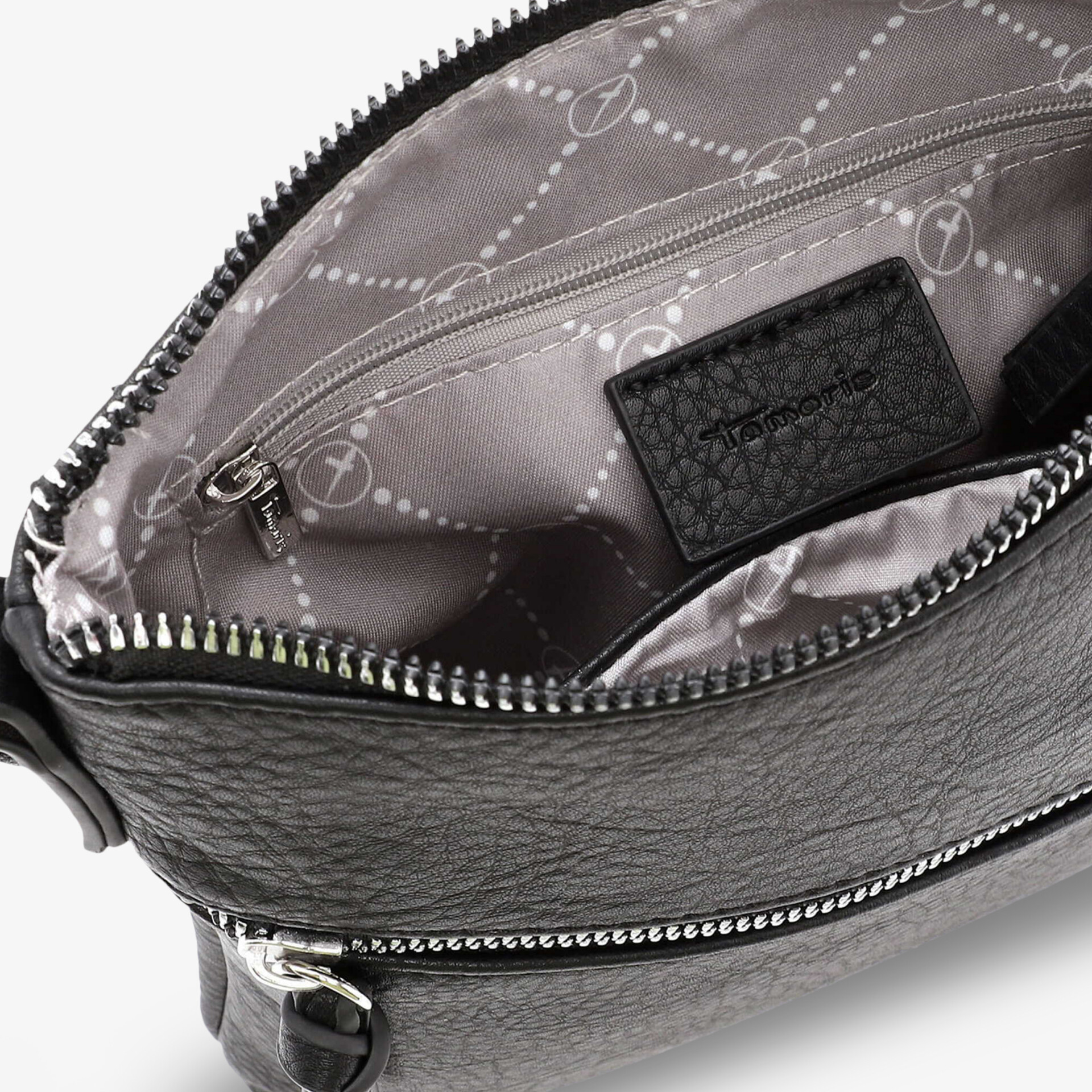 Elegante Tasche mit Reißverschluss, geräumigem Innenfach und stilvollem Futter in hochwertiger Lederoptik.