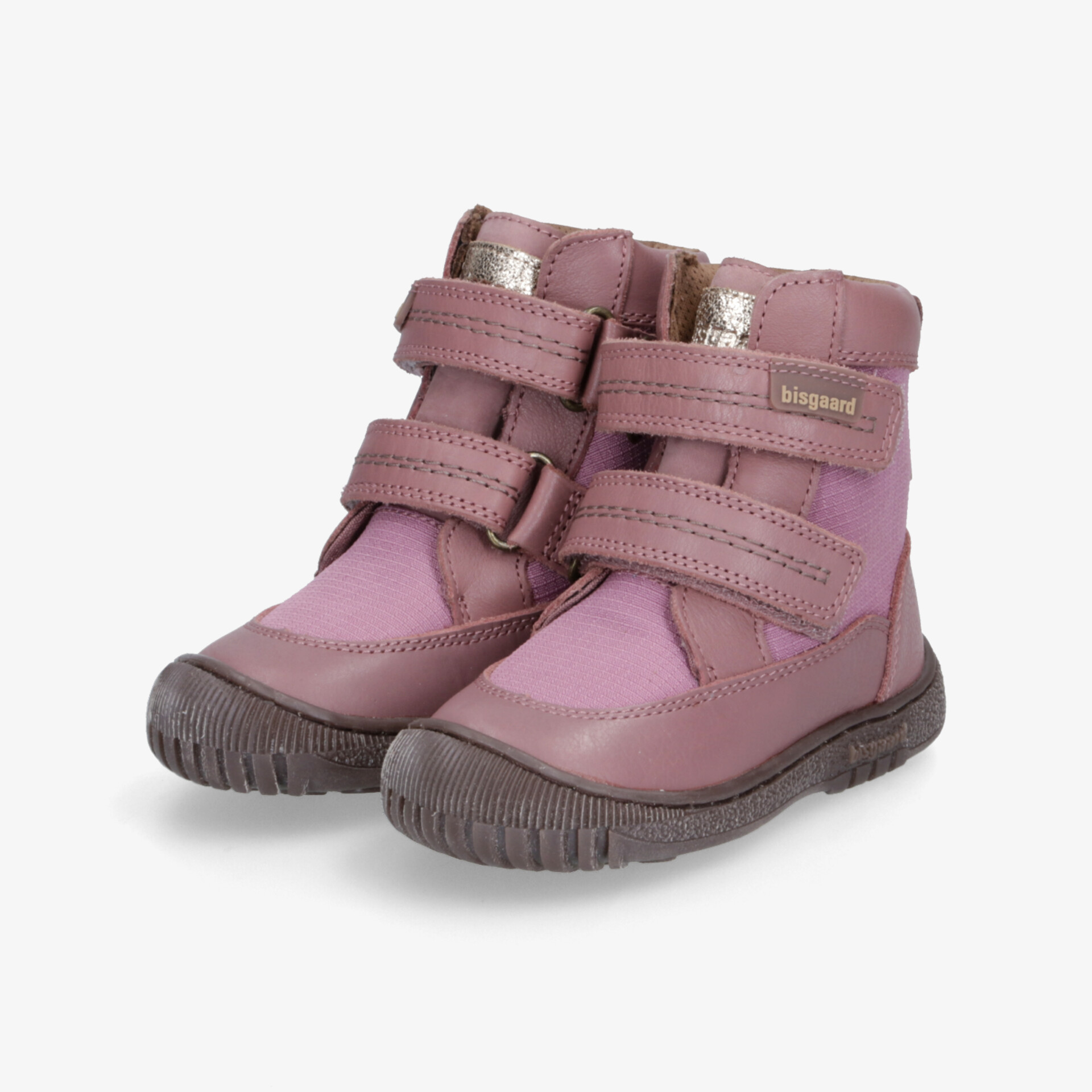 Rosafarbene Winterstiefel mit doppelten Klettverschlüssen und rutschfester Sohle, robust und bequem für kalte Tage