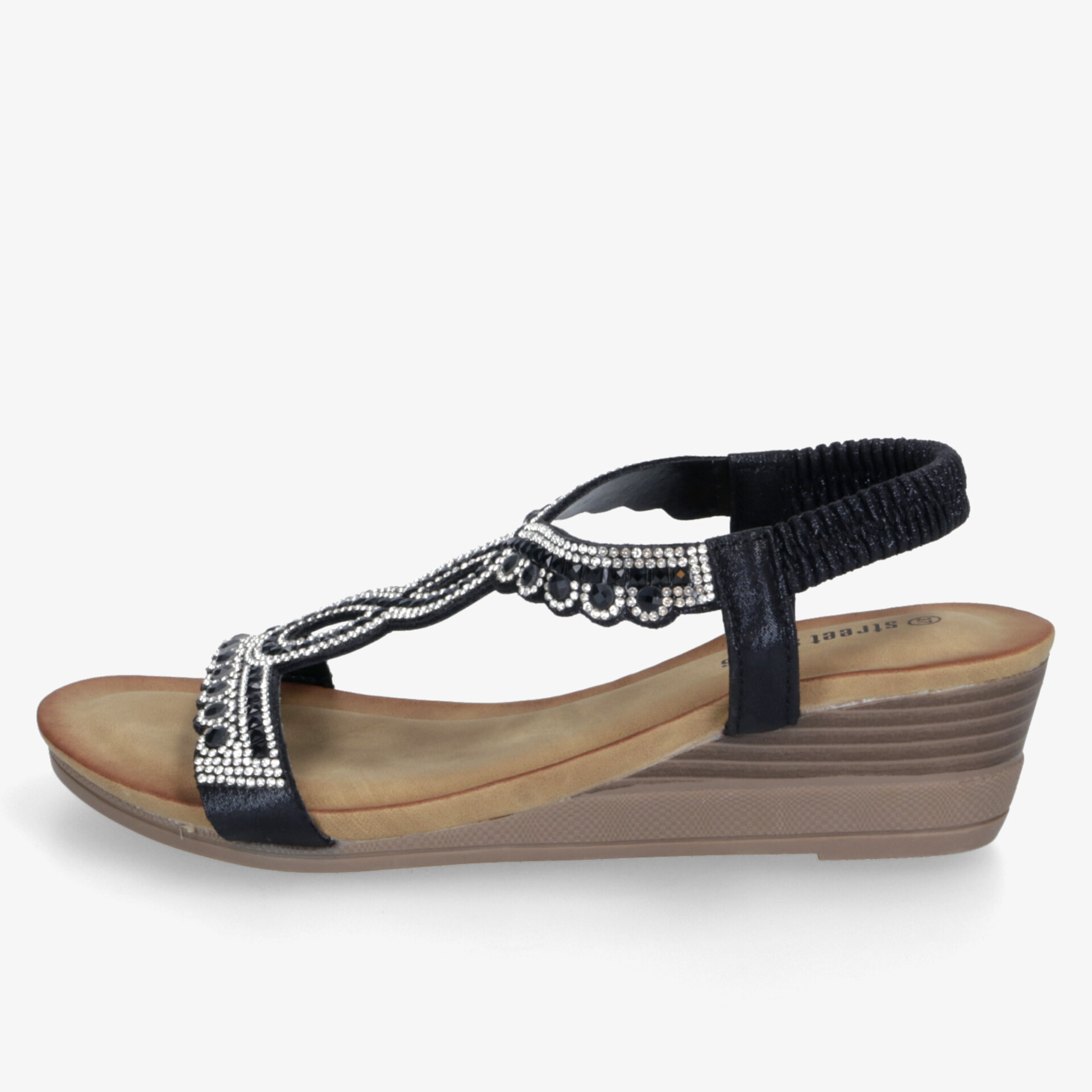Seitliche Ansicht einer eleganten Sandale mit Keilabsatz und dekorativen Perlen, komfortabler Passform