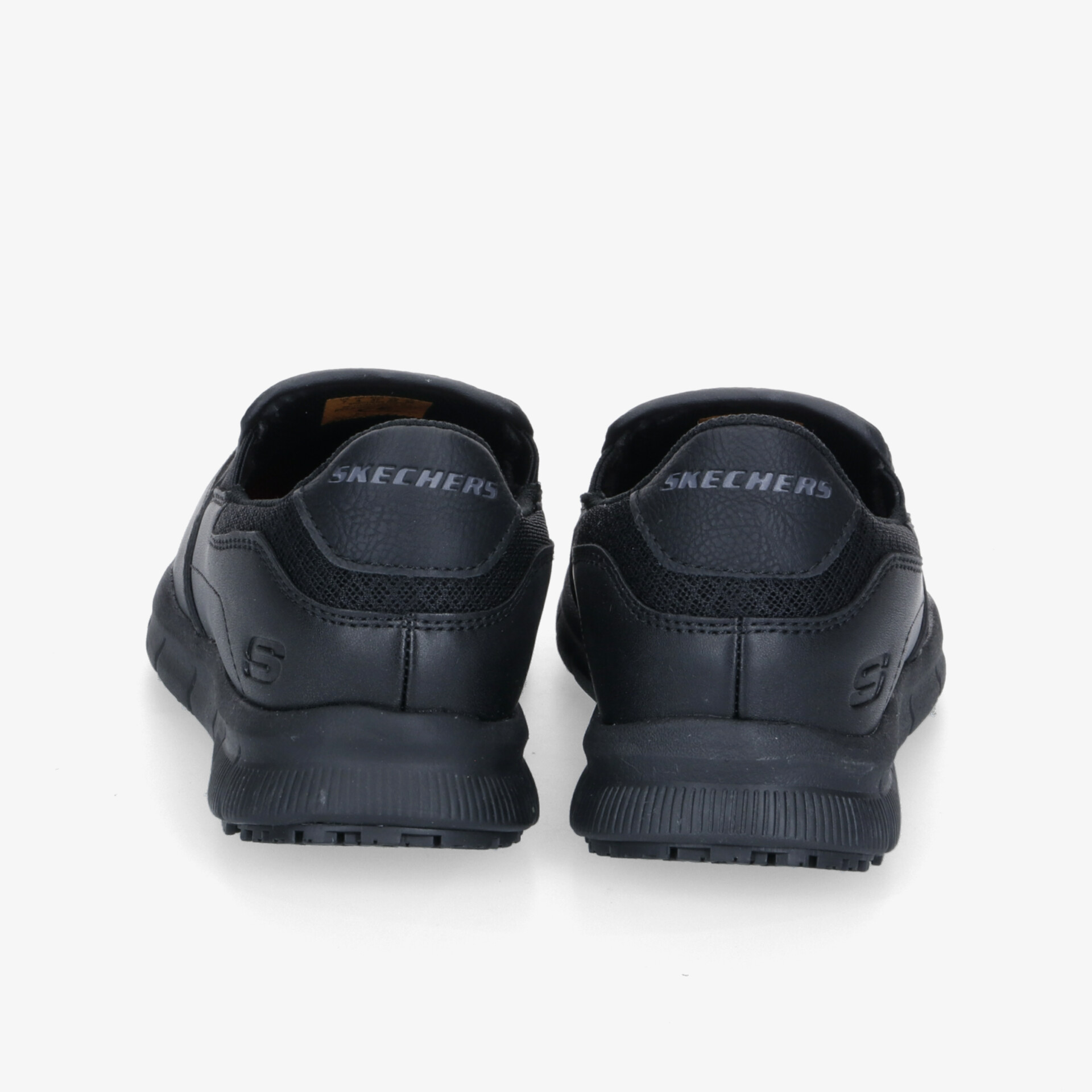 Elegante schwarze Schuhe mit robustem Design und rutschfester Sohle, ideal für täglichen Komfort und Stil.