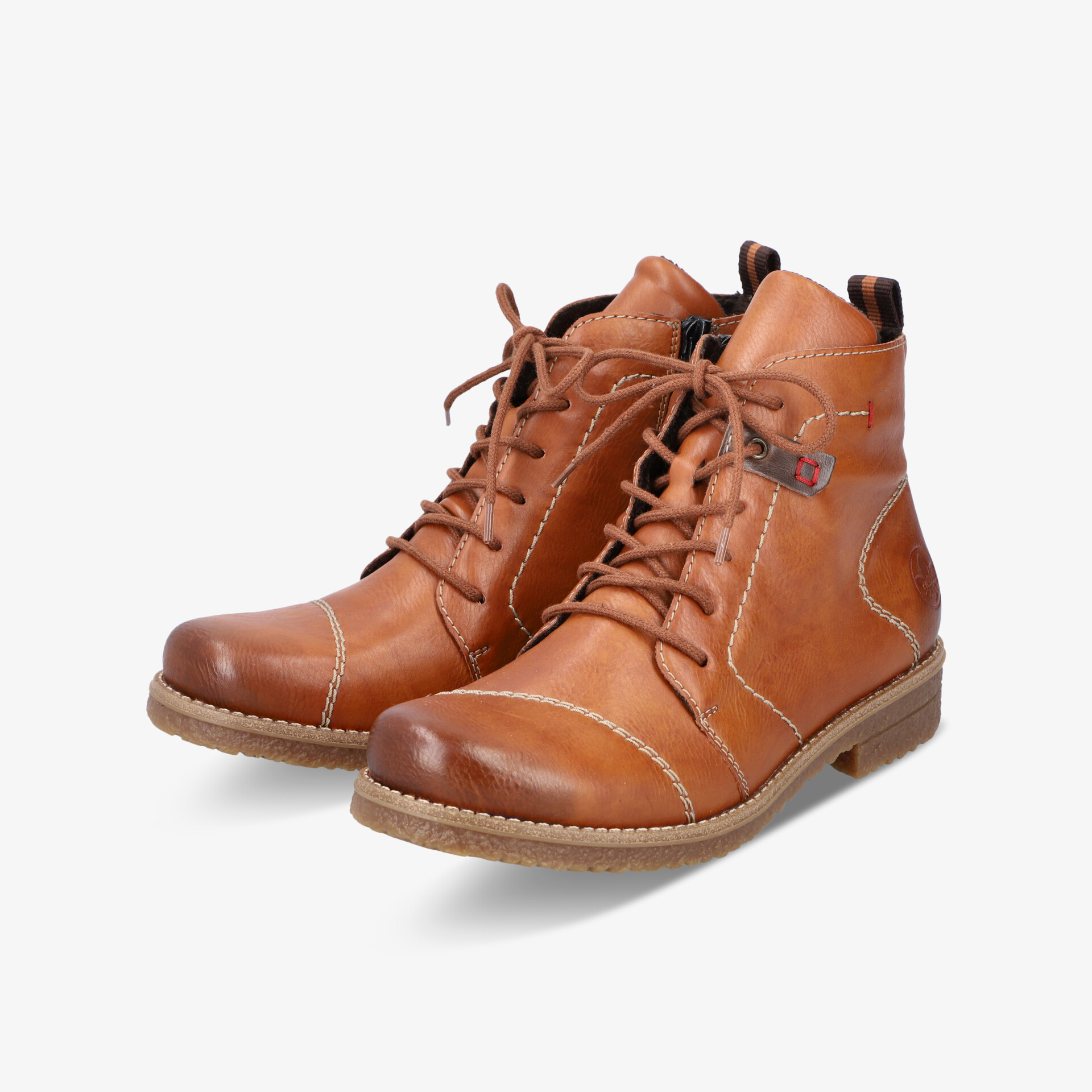 Braune Lederstiefel im Paar mit robuster Sohle und klassischer Schnürung, komfortabel und stilvoll gestaltet