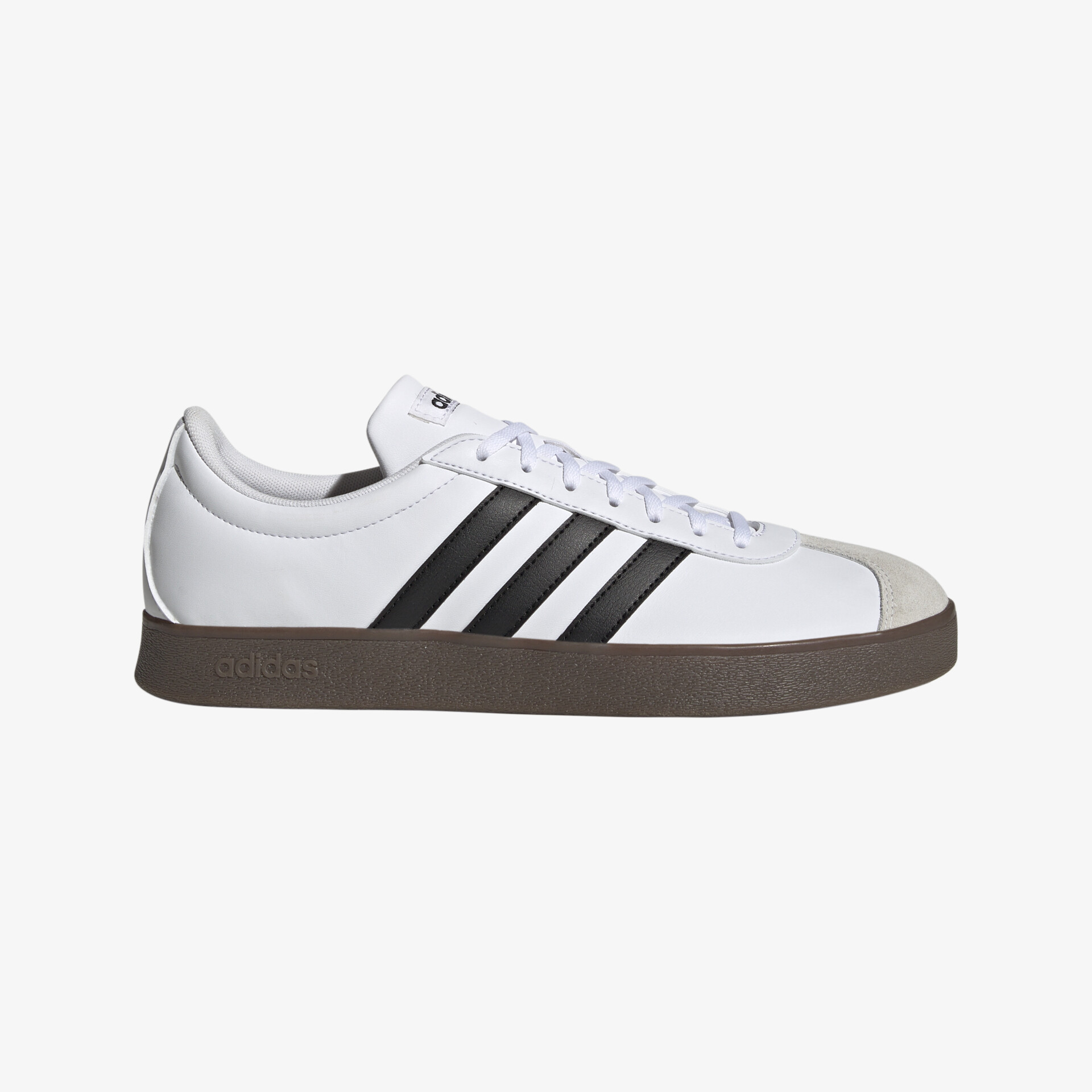 Klassische weiße Sneakers mit schwarzen Streifen und robuster Sohle, ideal für Alltag und Freizeit.