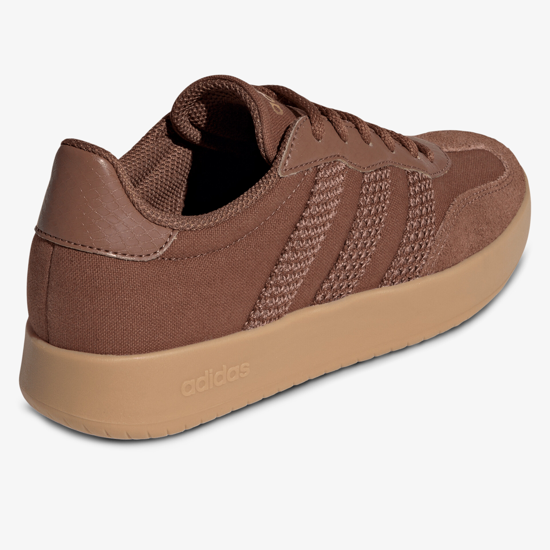 Brauner Sneaker aus Veloursleder mit gepolsterter Innensohle und rutschfester Gummisohle, seitliche Ansicht