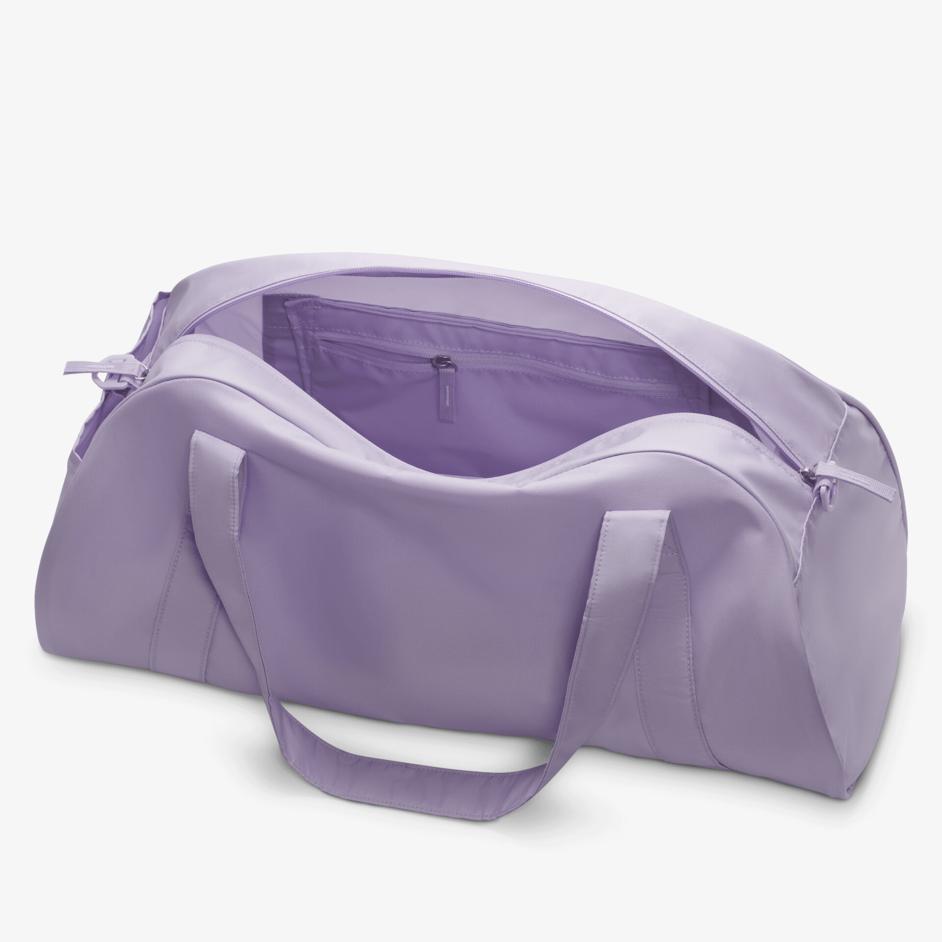 Offene lila Reisetasche liegend mit geräumigem Innenfach und robustem Tragegriff, perfekt für Reisen und Sport