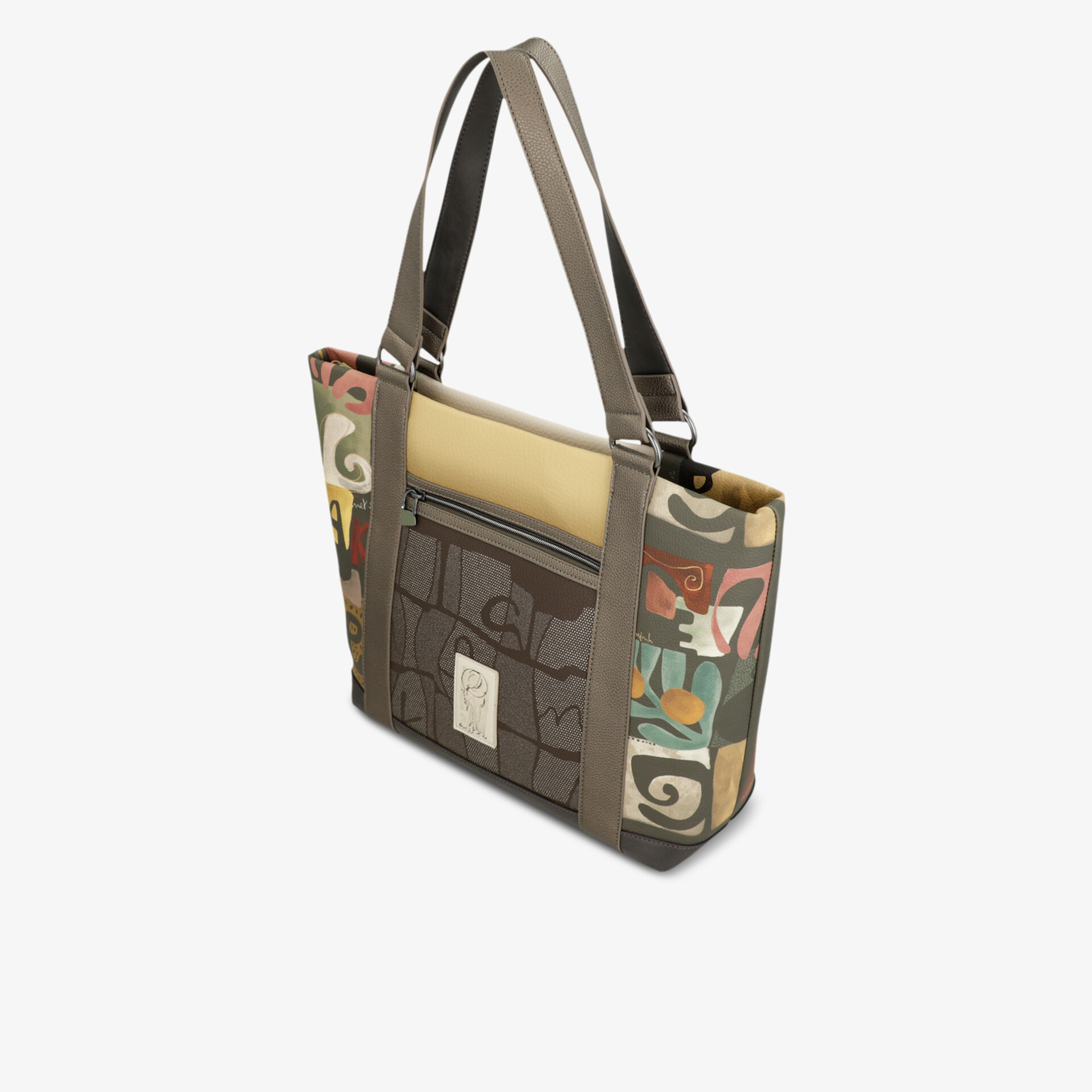 Große, modische Tasche mit buntem Muster und robusten Griffen, ideal für den Alltag.