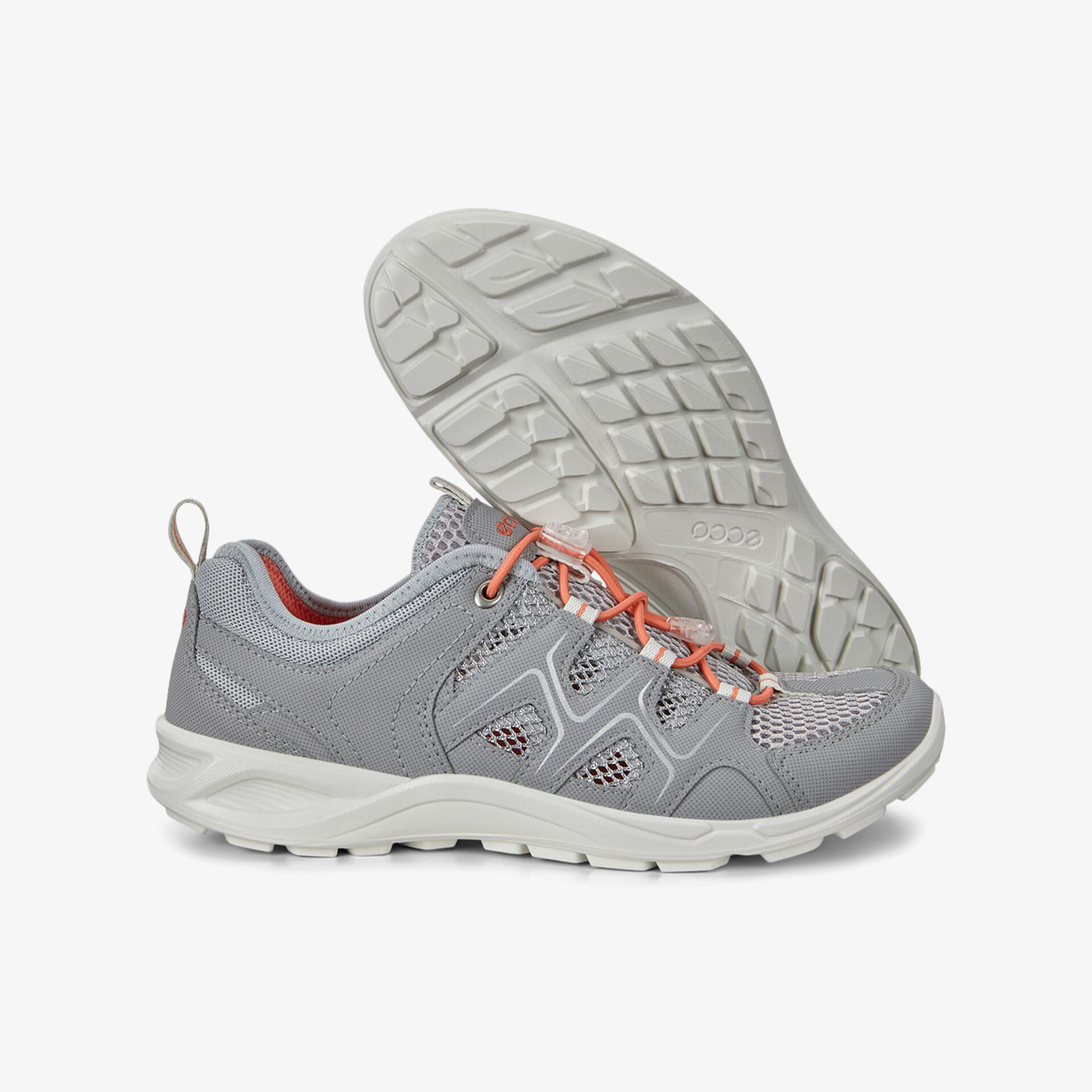 Graue Outdoor-Schuhe mit robuster Sohle und atmungsaktivem Design für optimalen Komfort und Halt.