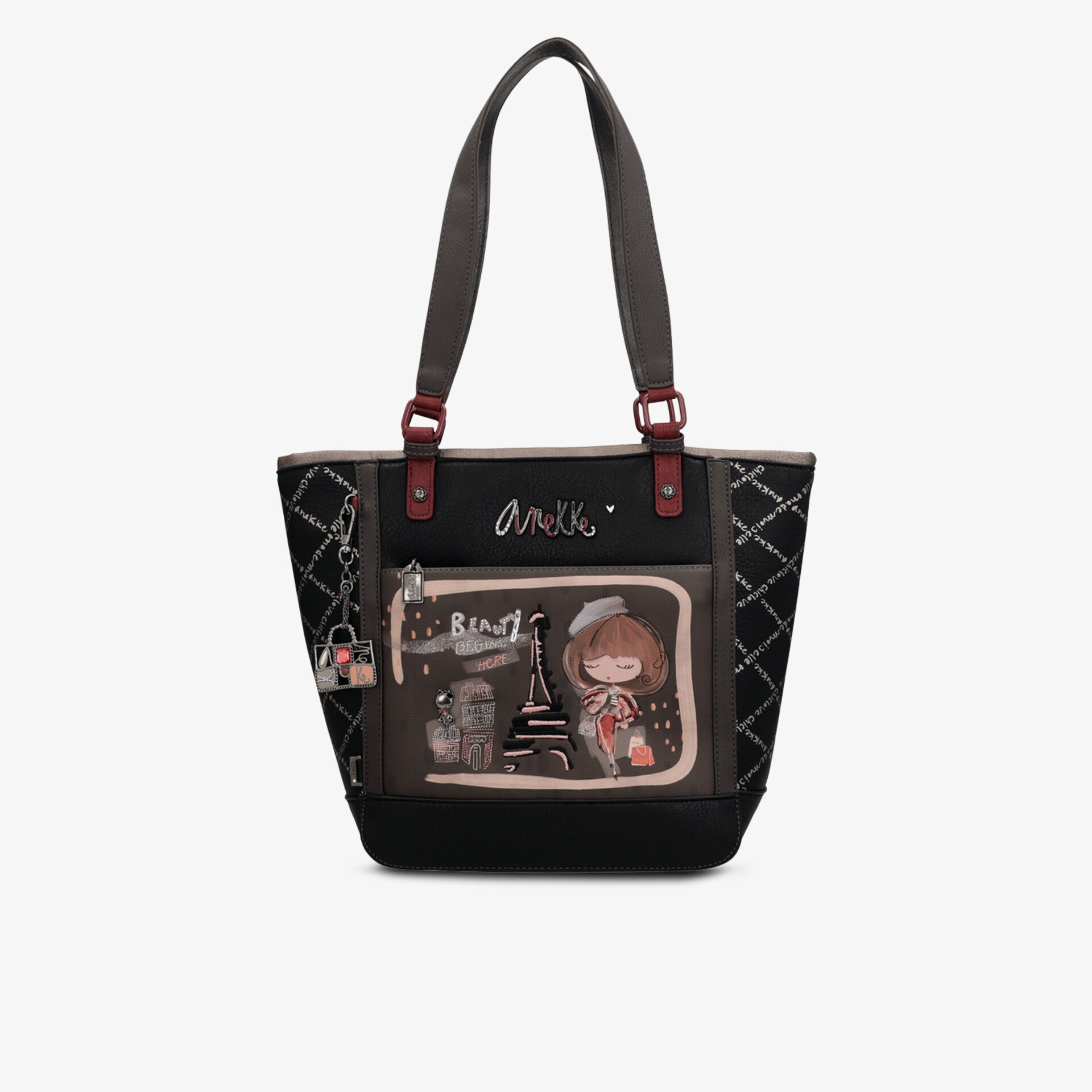 Stylische schwarze Tasche mit auffälligem Muster und robusten Henkeln, ideal für den Alltag