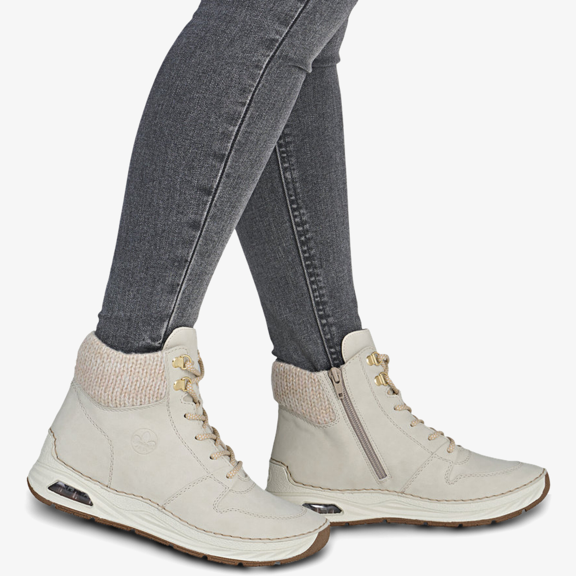 Bequeme und warme Freizeitstiefel mit seitlichem Reißverschluss und rutschfester Sohle in neutralem Ton