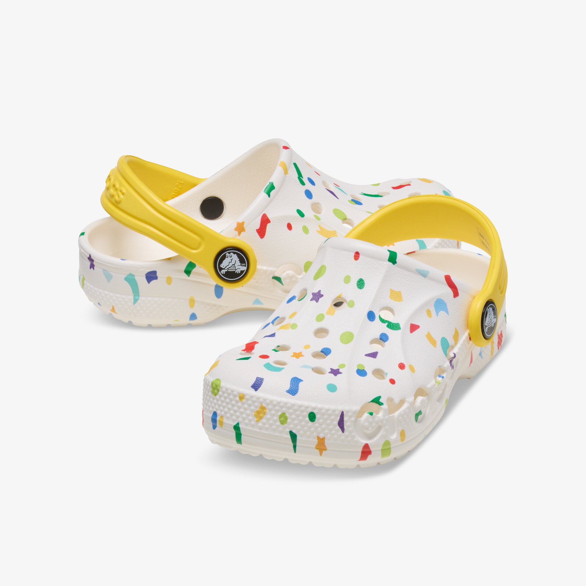 Leichte, bequeme Clogs mit buntem Muster und gelbem Riemen in schräger Frontansicht