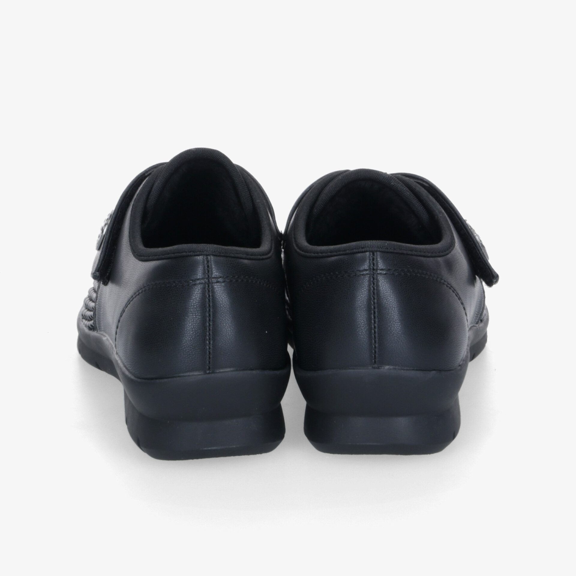 Schwarze Schuhe in Rückansicht, bequem und robust mit rutschfester Sohle und klassischem Design als Paar