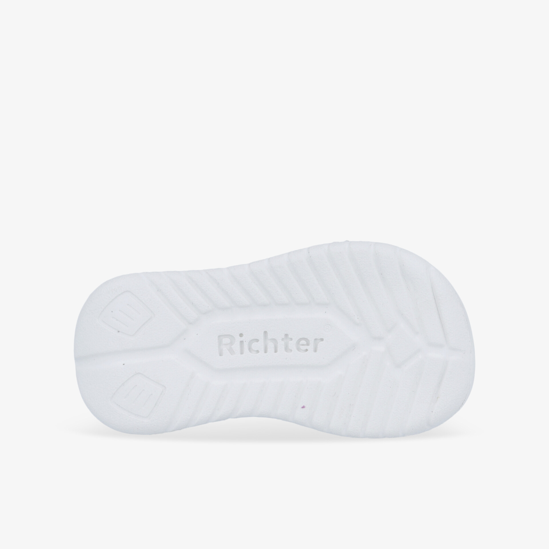 Weiße Schuhsohle mit Profil für sicheren Halt und langlebige Trageeigenschaften