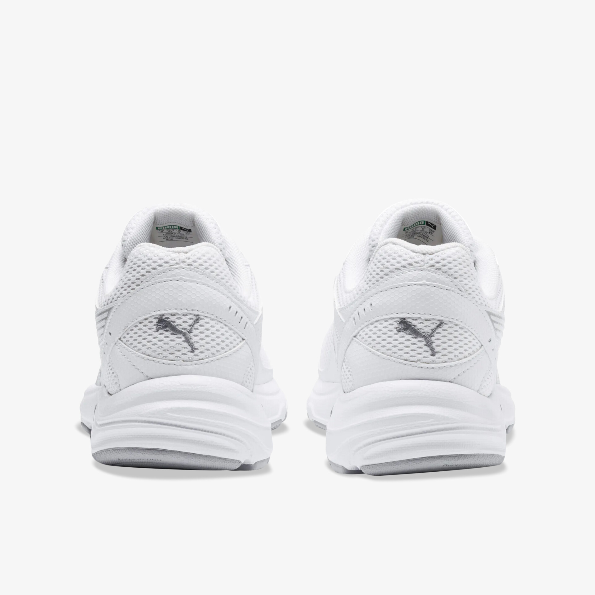 Weiße Puma Sneaker Rückansicht mit stabiler Sohle und sportlichem, bequemem Design für optimalen Tragekomfort