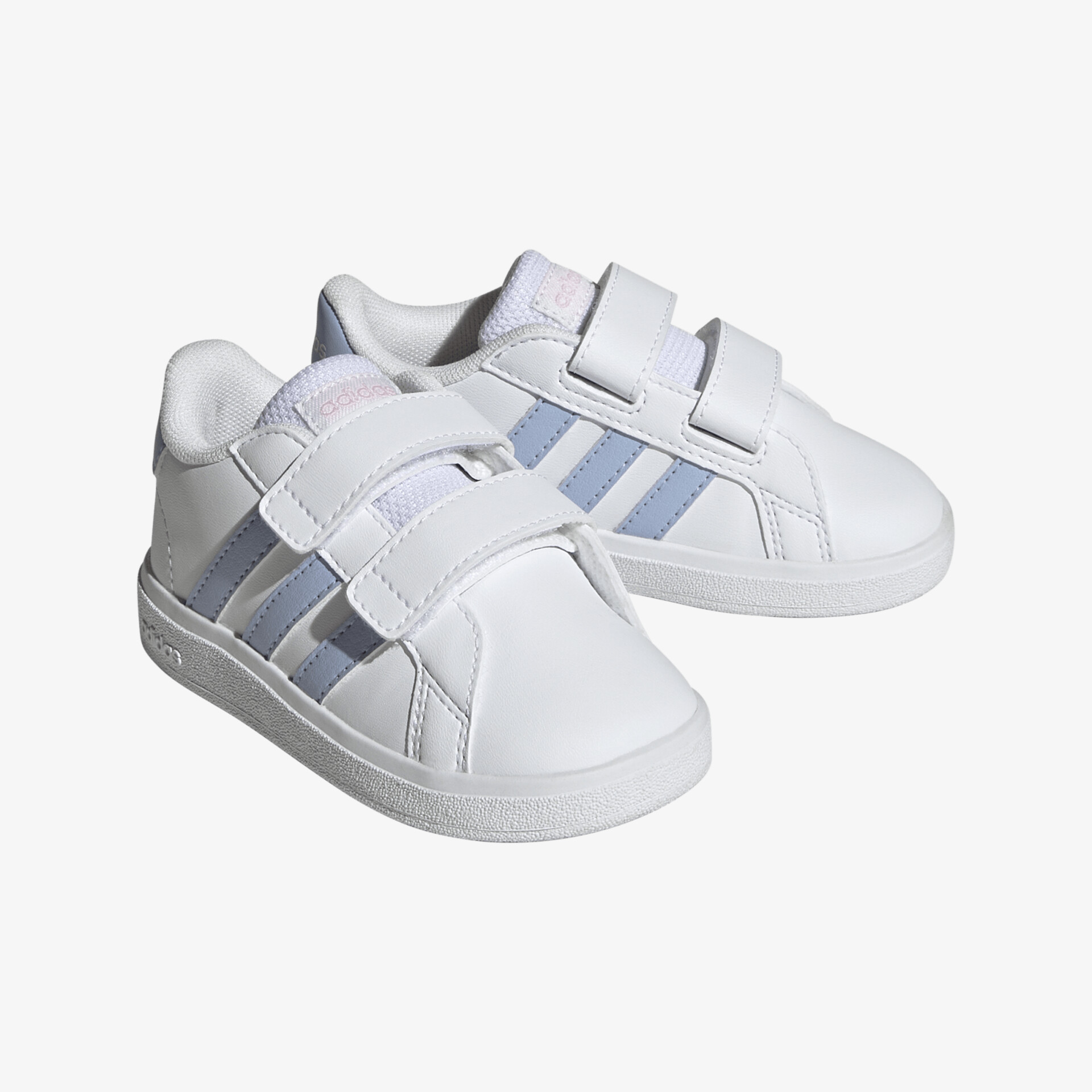 Bequeme und stilvolle weiße Sneaker mit Klettverschluss und blauen Streifen