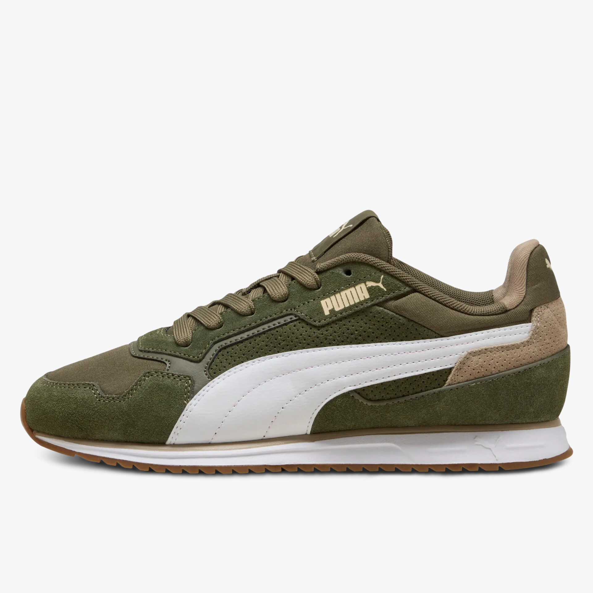 seitliche Ansicht eines sportlichen Puma Schuhs in grün mit weißem Logo und profilierter Sohle