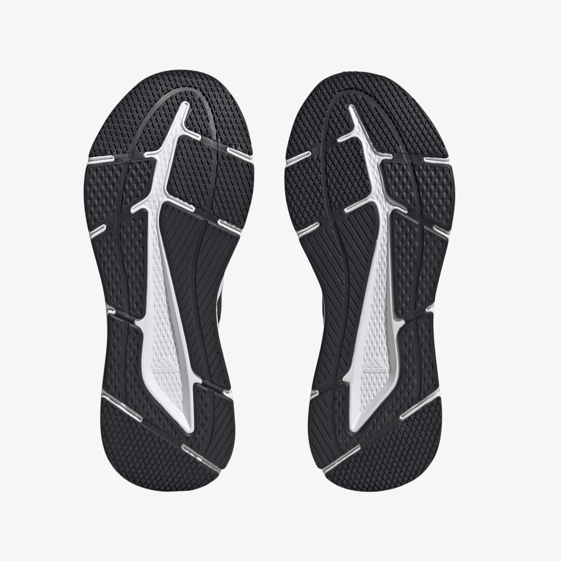 Schuhsohlen mit rutschfestem Profil und stoßdämpfender Technologie für optimalen Halt und Komfort beim Sport.