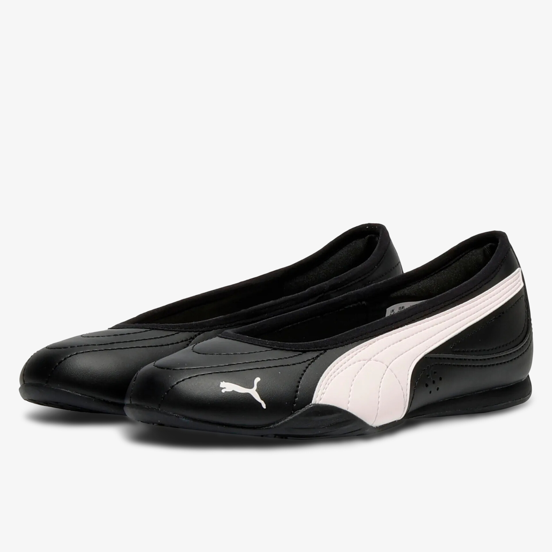 Sportliche schwarze Lederschuhe mit weißem Seitenstreifen, bequem und leicht für den Alltag