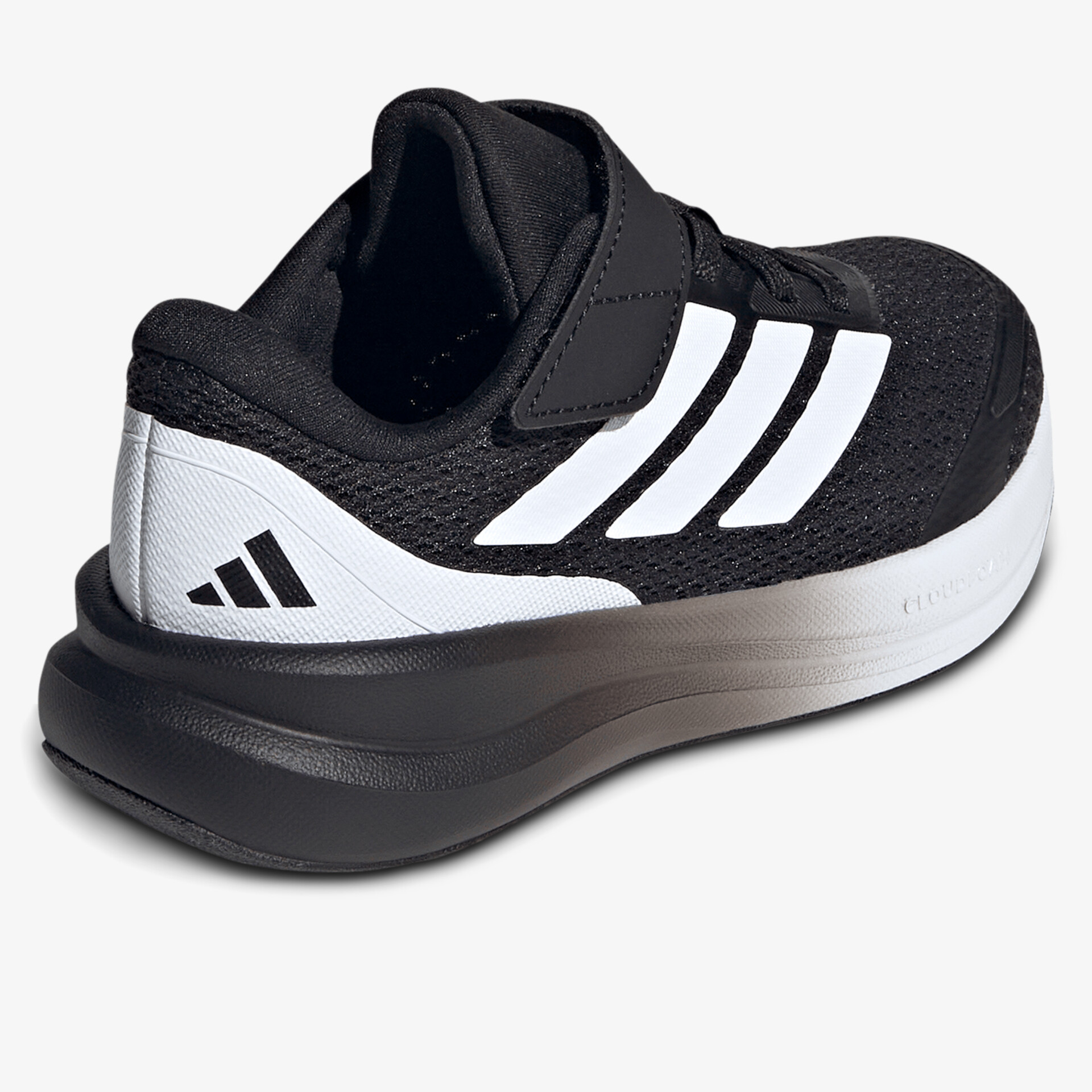 Schwarzer Sportschuh mit weißem Streifendesign und bequemem Klettverschluss, seitliche Ansicht