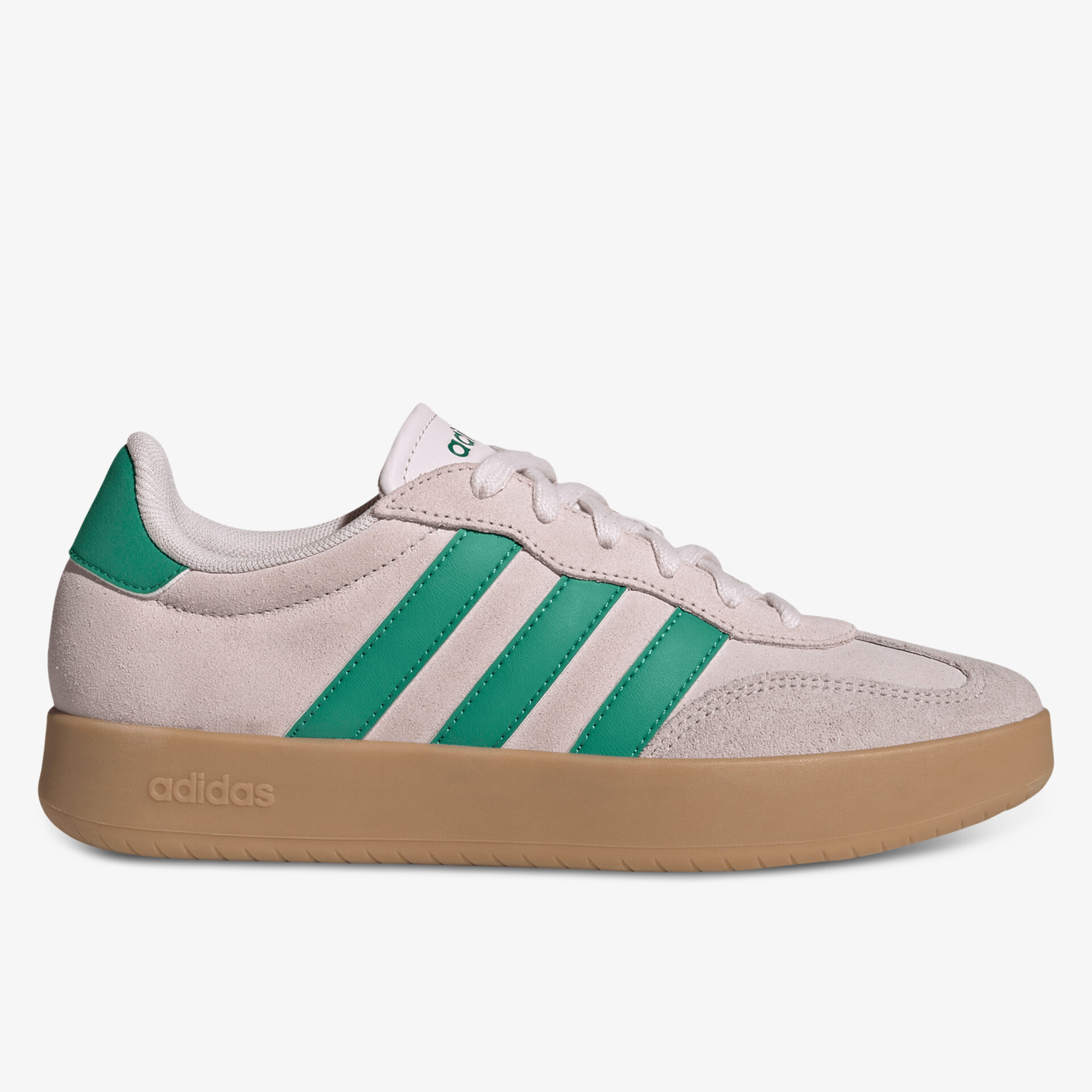 Seitliche Ansicht eines bequemen Sneakers mit griffiger Gummisohle und stilvollen grünen Streifen