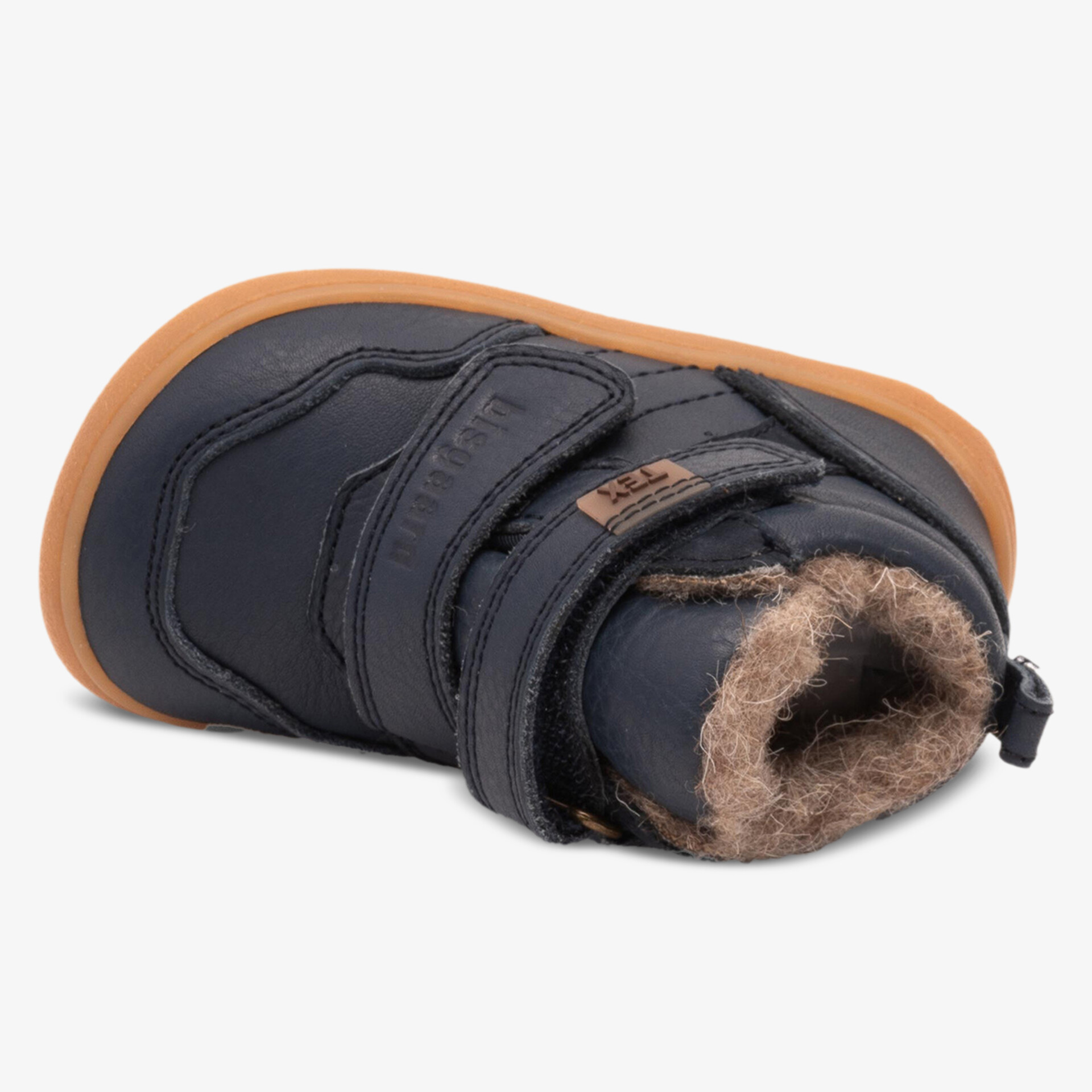 Warmer Kinderschuh mit weichem Fellfutter und praktischem Klettverschluss für sicheren Halt und Komfort