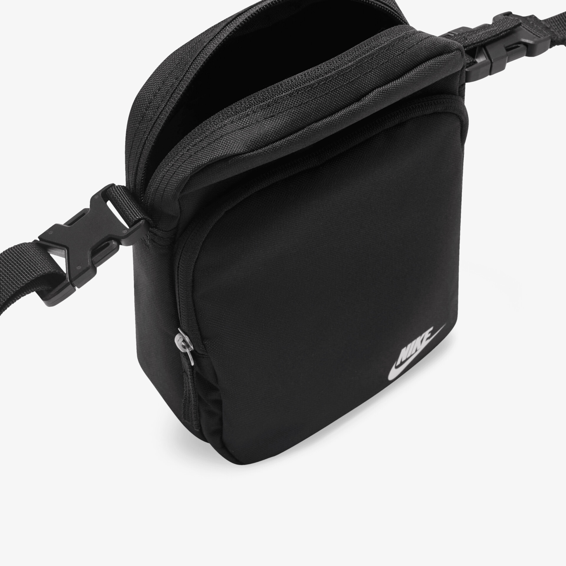 Kompakte schwarze Umhängetasche mit mehreren Fächern und robustem Reißverschluss, ideal für den Alltag