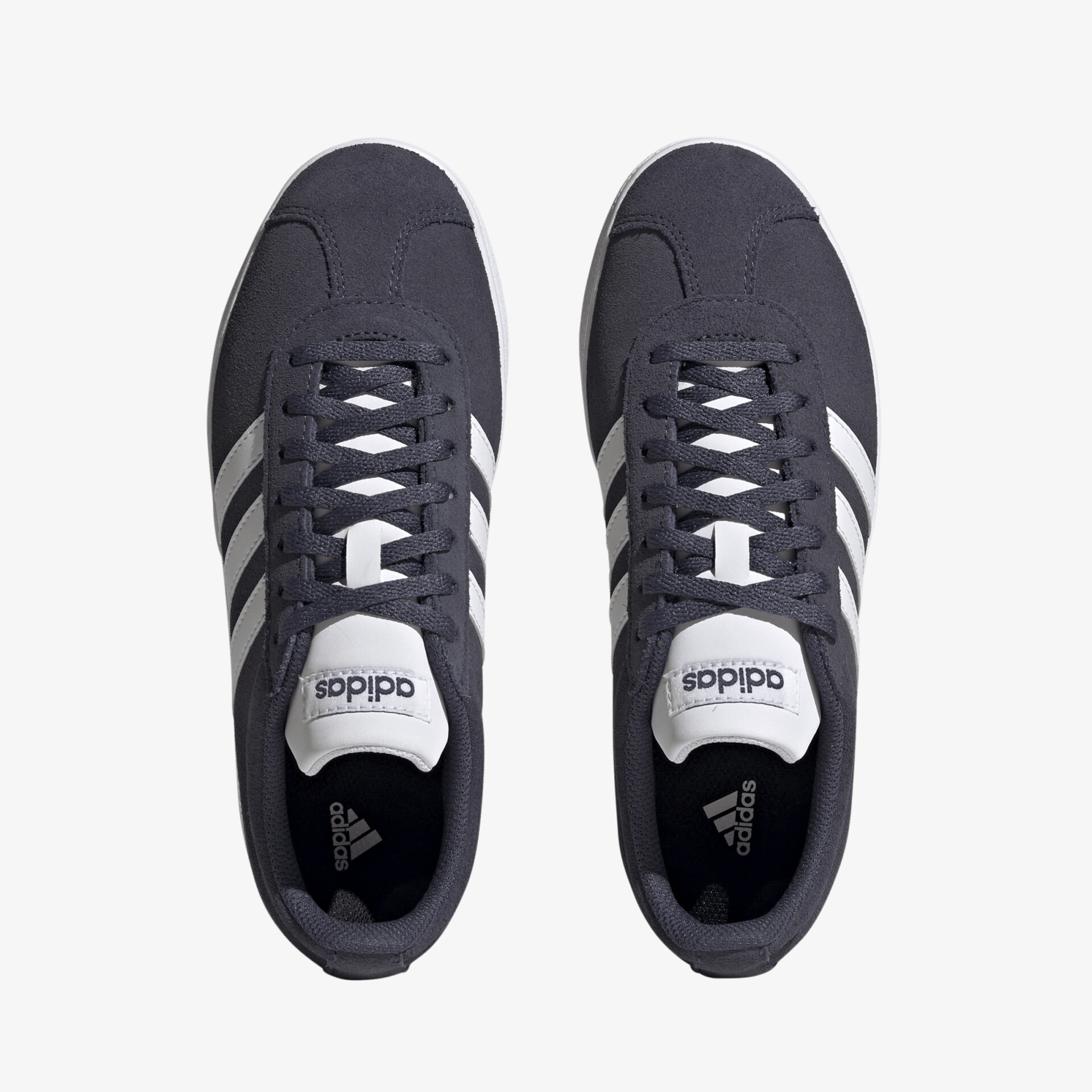 Elegante schwarze Sneaker mit klassischen weißen Streifen für trendigen Komfort und sportlichen Look.