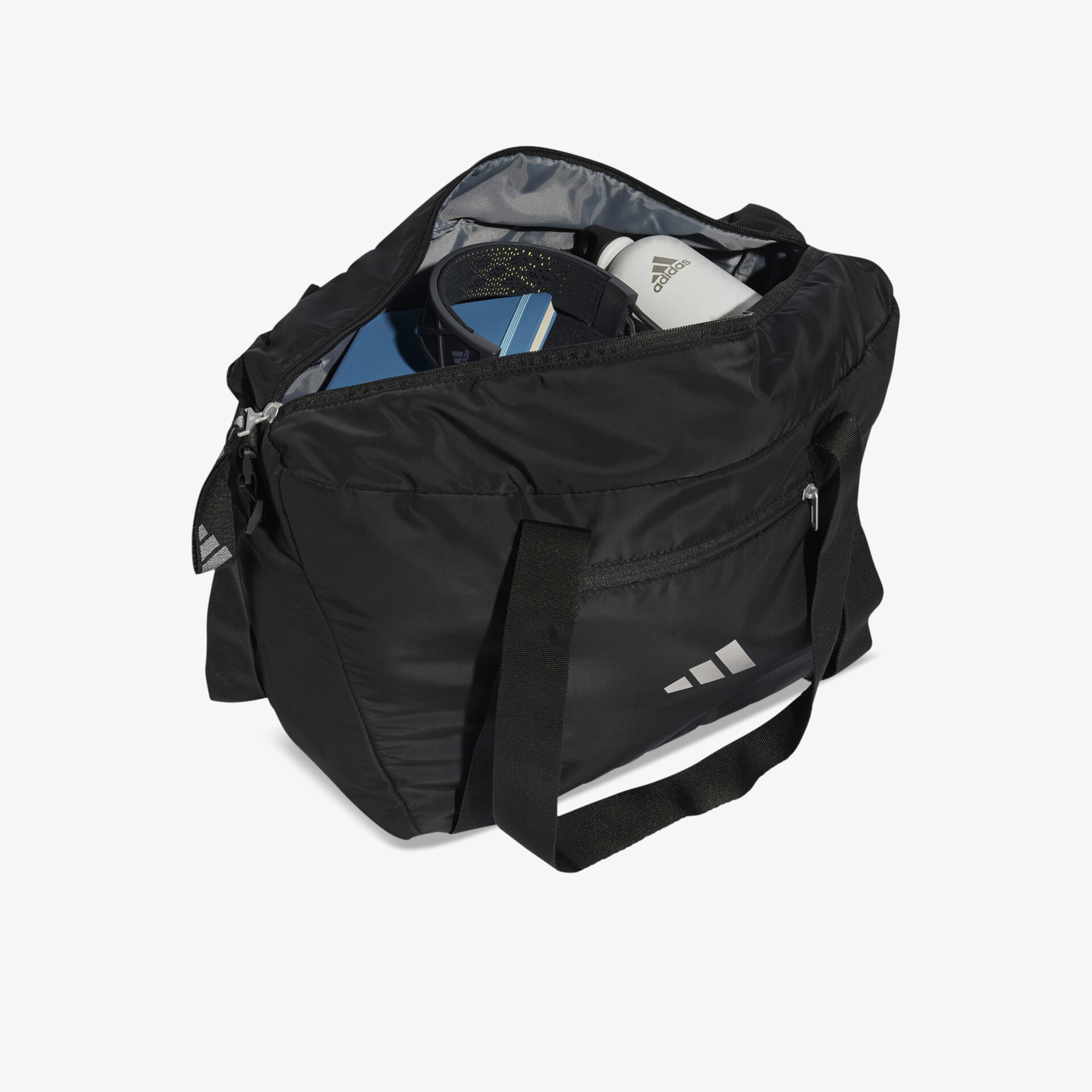 Schwarze geräumige Sporttasche mit Reißverschluss und robustem Tragegurt, ideal für Freizeit und Training