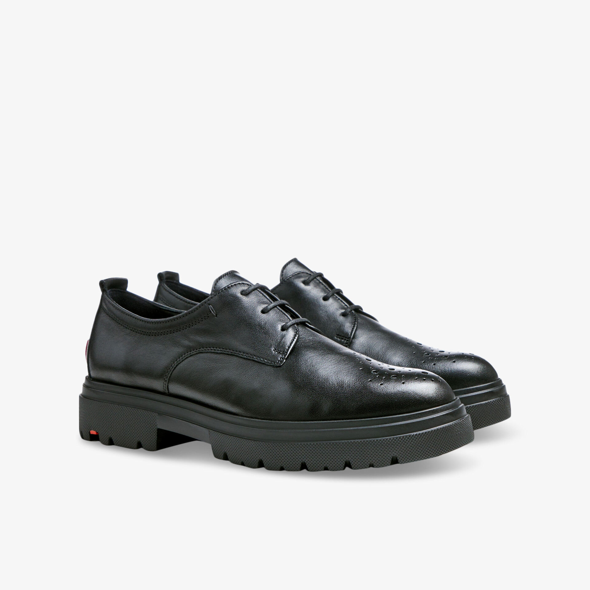 Robuste, stilvolle Schnürschuhe aus hochwertigem Leder mit komfortabler, griffiger Sohle für vielseitigen Einsatz.