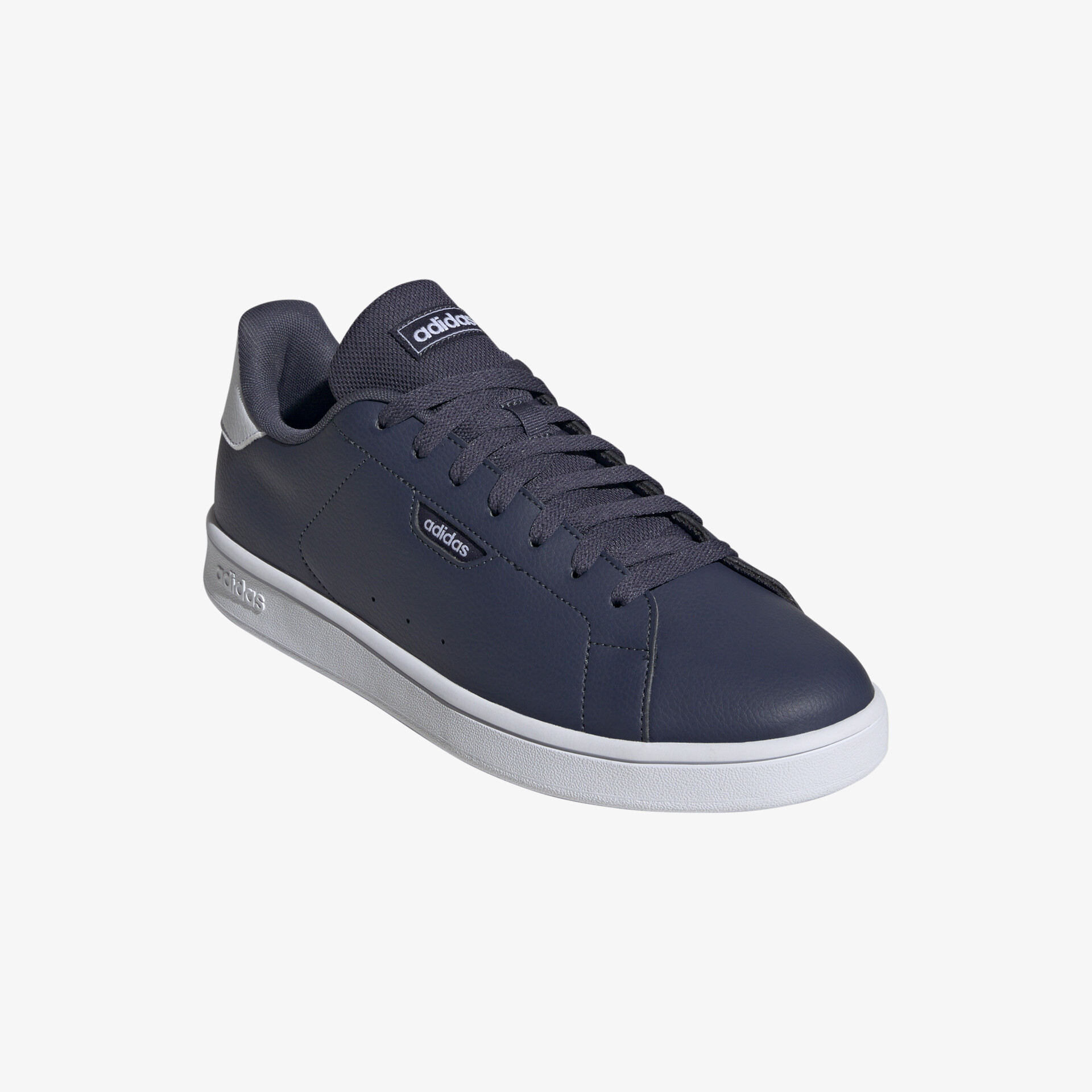 Klassischer dunkelblauer Sneaker mit weißer Sohle für vielseitigen Stil und Komfort.