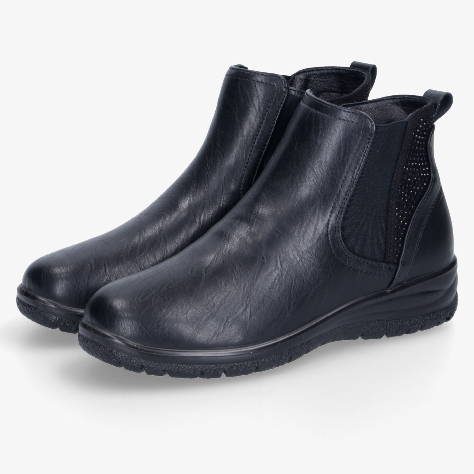 Schwarze Chelsea Boots im Paar mit elastischen Einsätzen für angenehmen Tragekomfort und modernen Look
