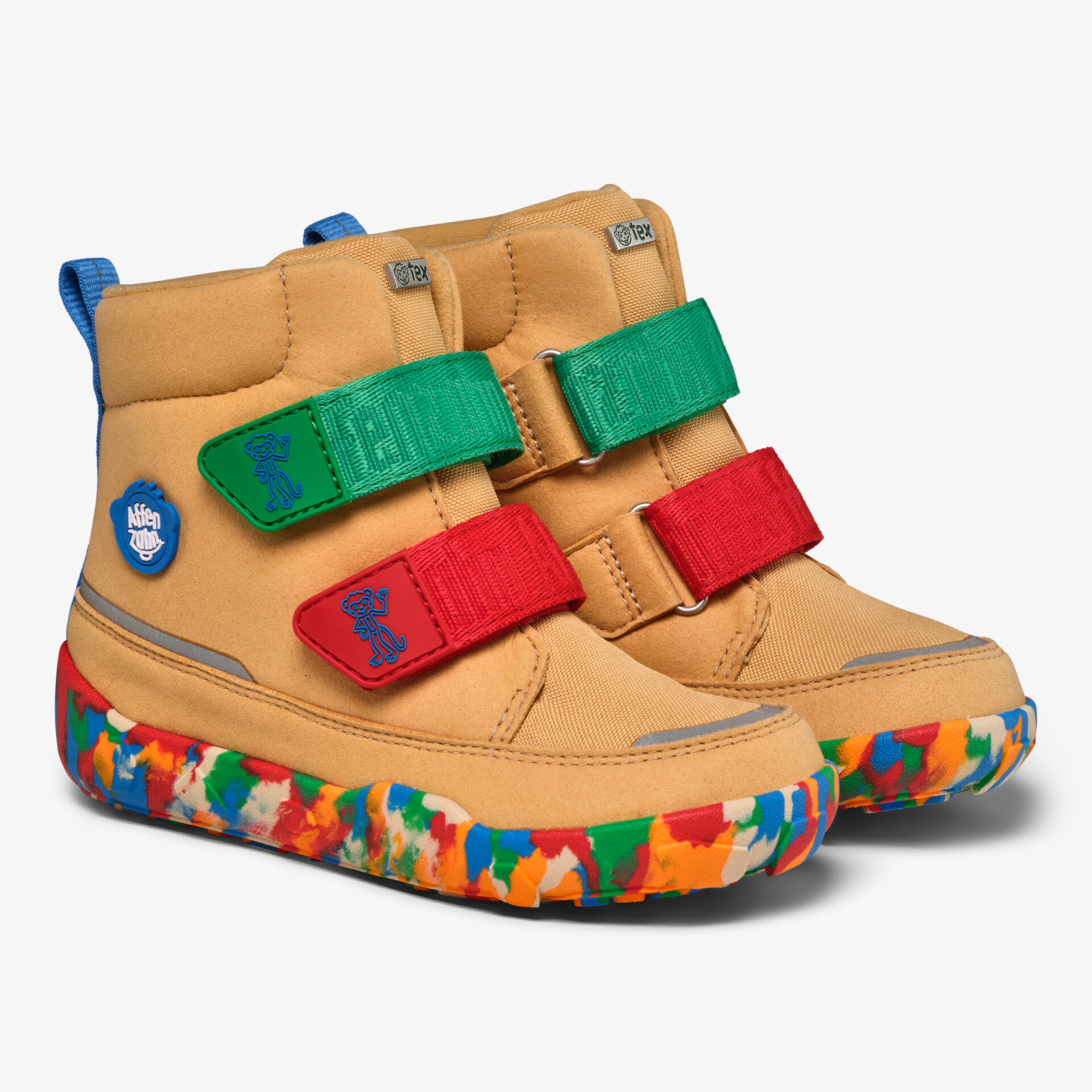 Bequeme und robuste Kinderschuhe mit bunten Sohlen und farbigen Klettverschlüssen für einfachen Halt