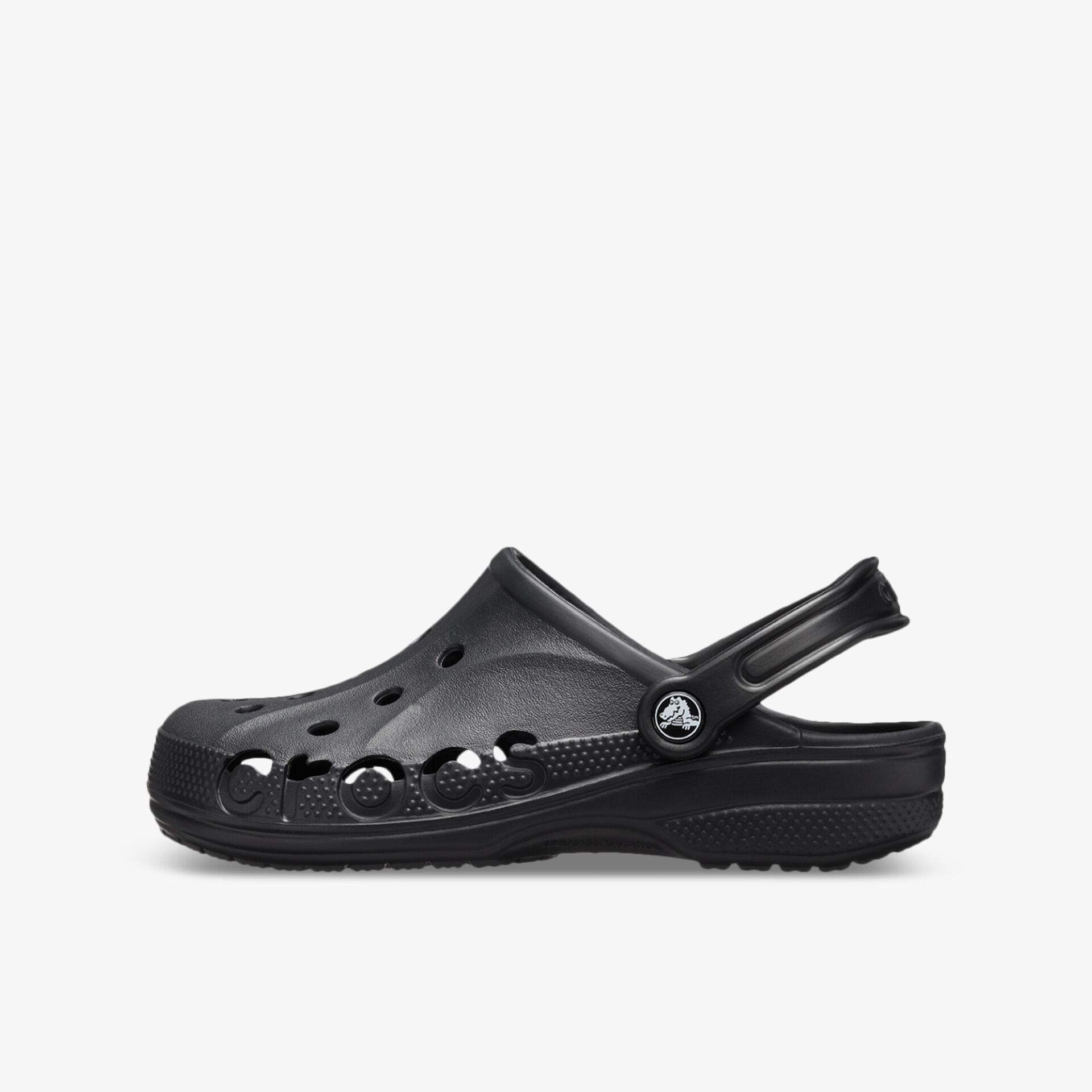 Seitliche Ansicht eines schwarzen Clogs mit atmungsaktiven Öffnungen und verstellbarem Fersenriemen