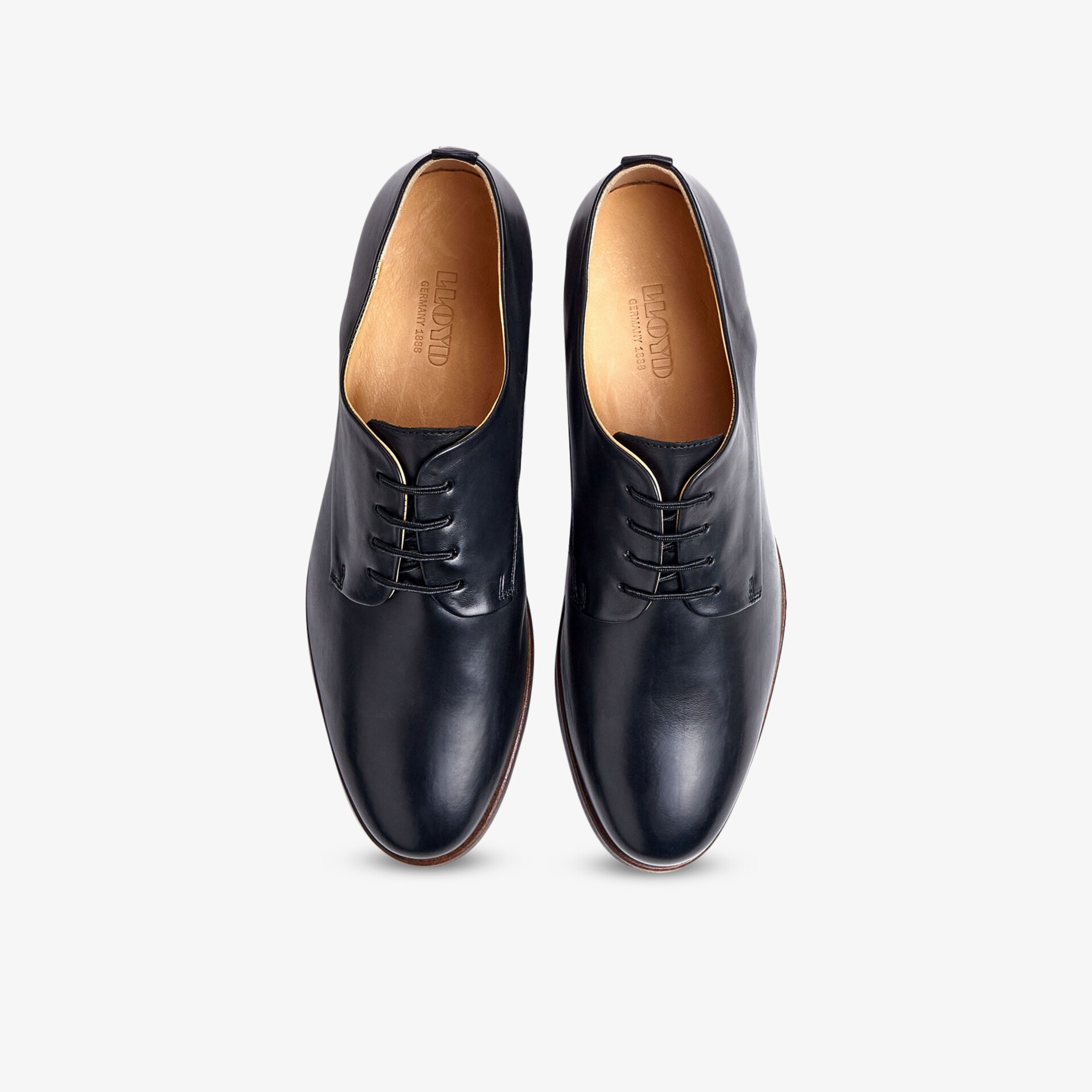 Elegante schwarze Lederschuhe in klassischem Design mit Schnürung und komfortabler Passform von oben fotografiert.