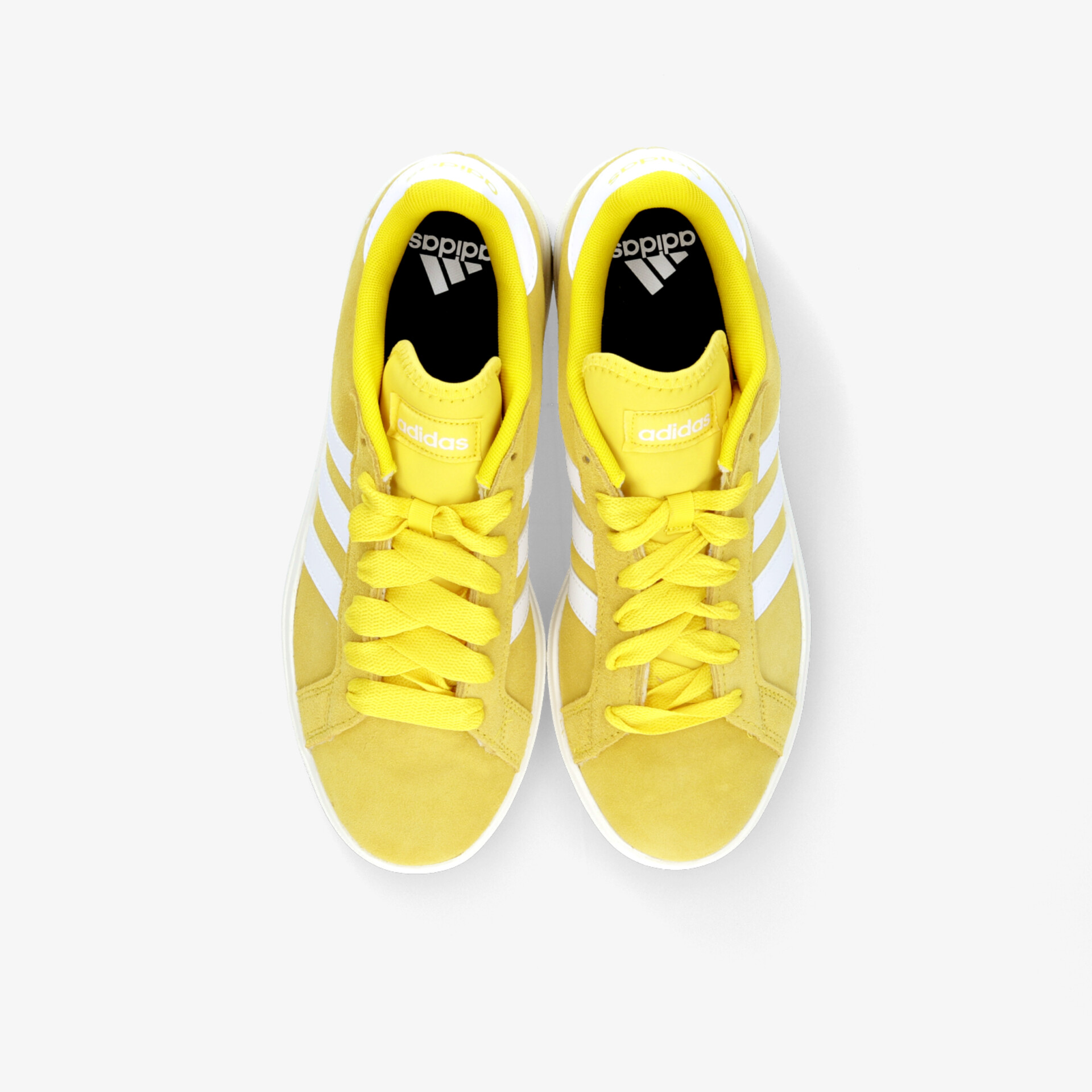 Gelbe Adidas Sneaker mit bequemen Schnürsenkeln, sportlichem Design und langlebigem Material