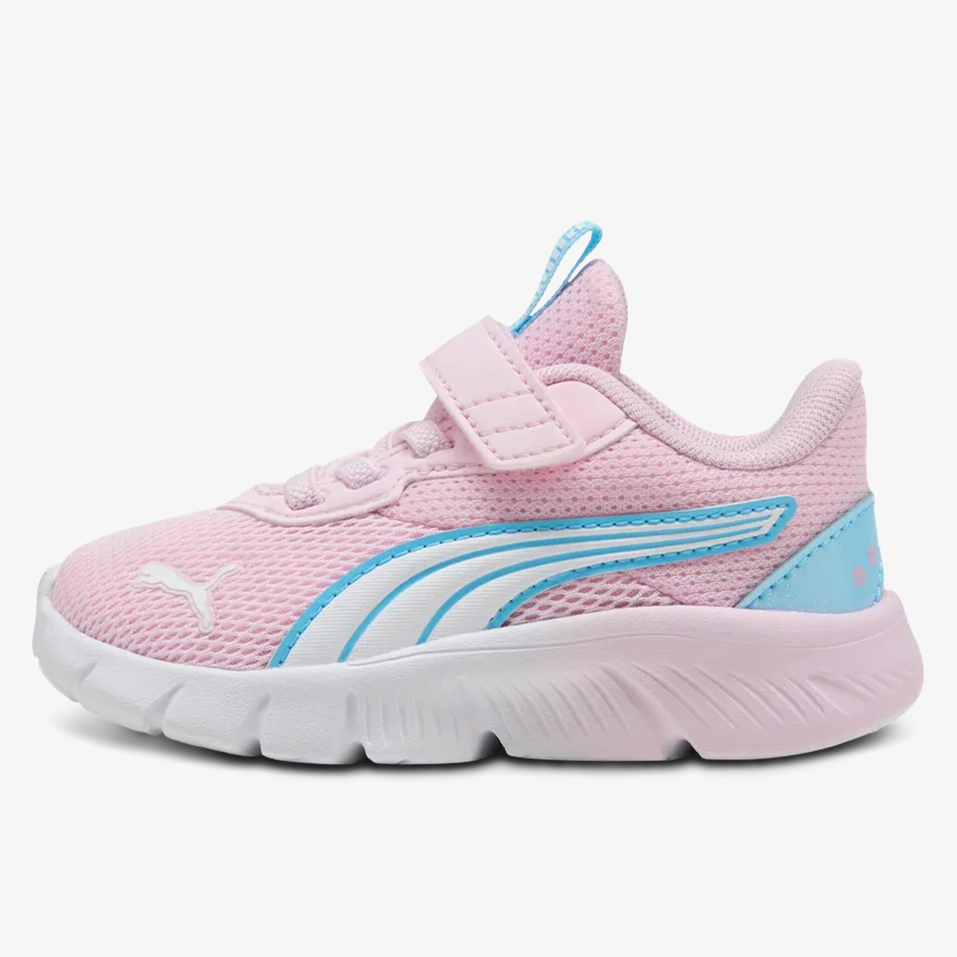 Seitliche Ansicht eines leichten Sportschuhs mit atmungsaktivem Mesh und flexiblem Sohlenprofil in pastellfarben