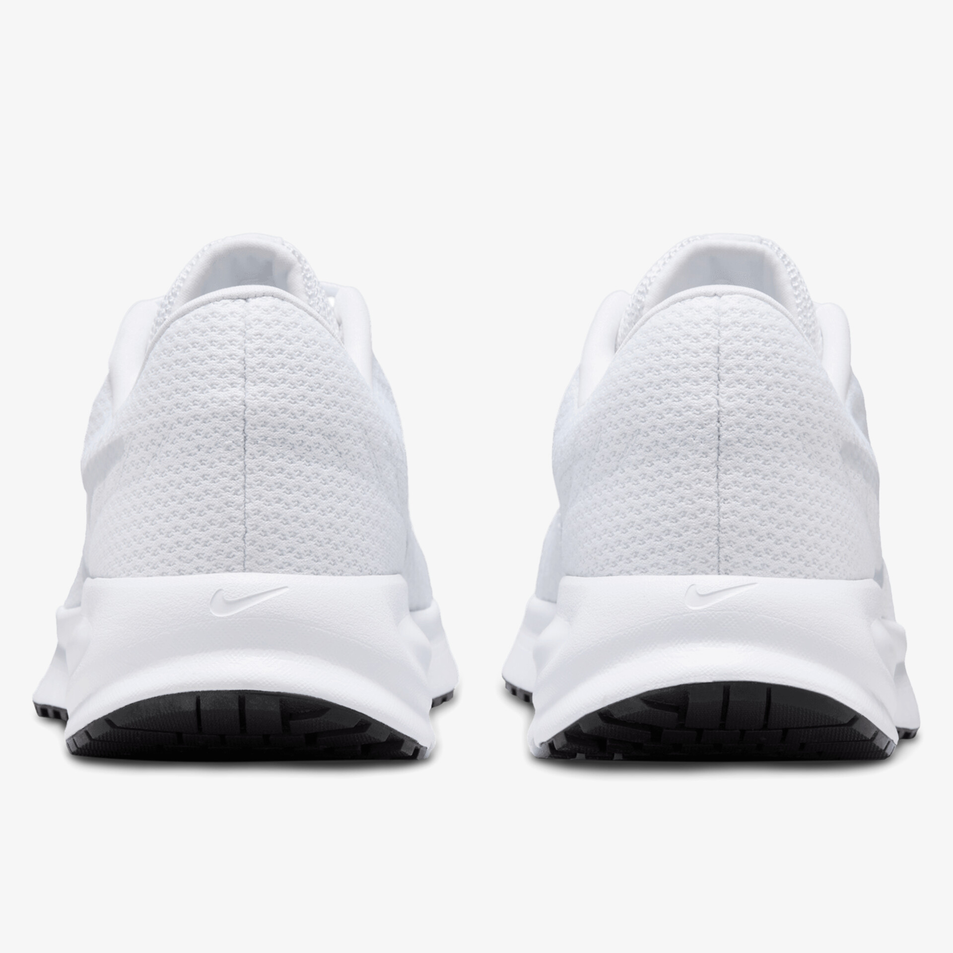 Moderner weißer Laufschuh mit atmungsaktivem Material und rutschfester Sohle, Rückansicht