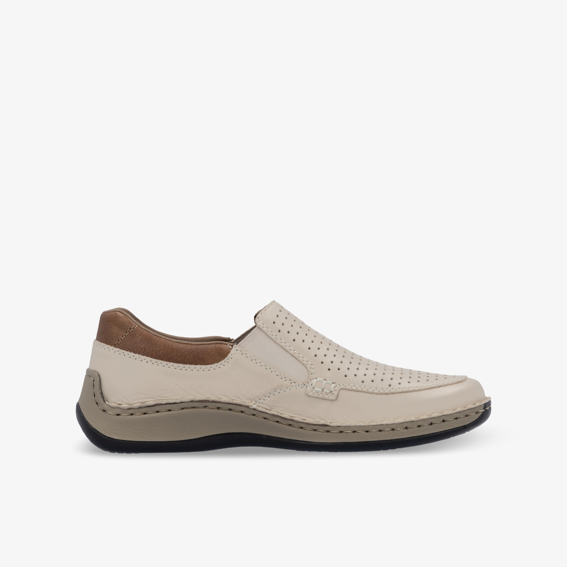 Bequemer Leder-Slipper in beige mit flexibler Sohle und luftdurchlässigem Material, seitliche Ansicht