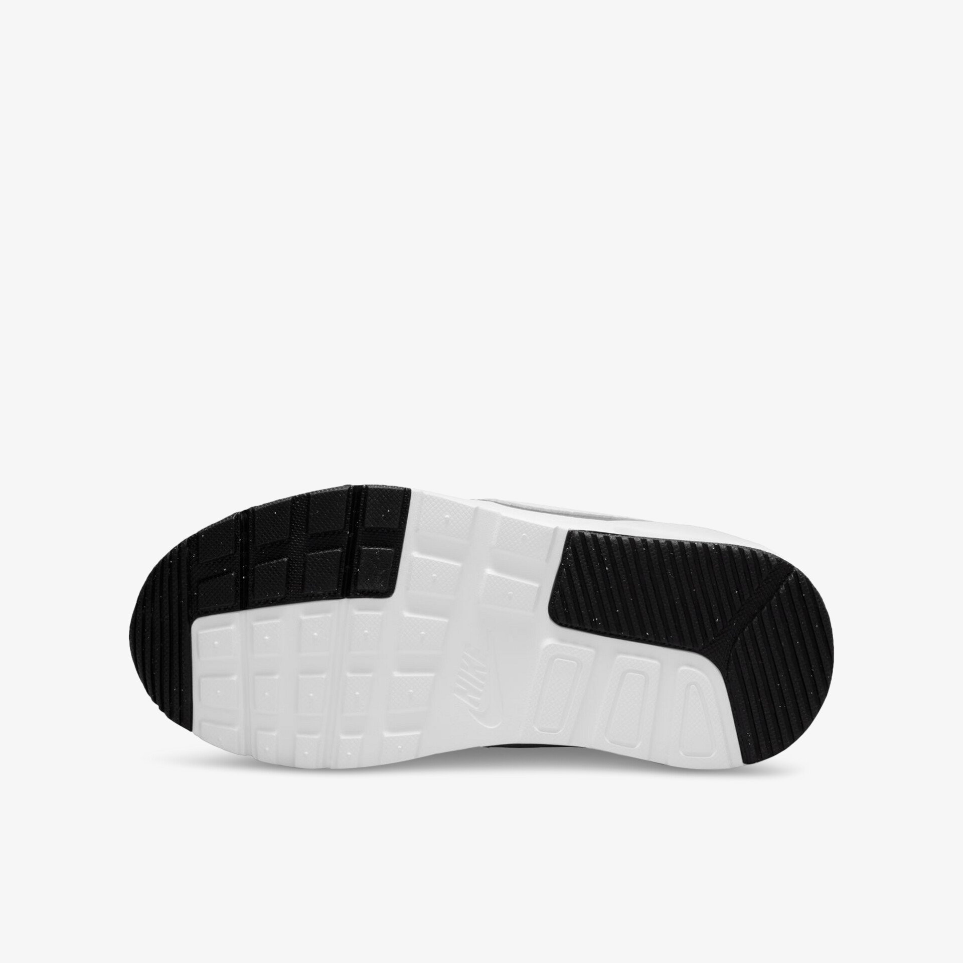 Rutschfeste schwarze und weiße Gummisohle für optimalen Halt und Komfort bei Sport- und Freizeitaktivitäten.