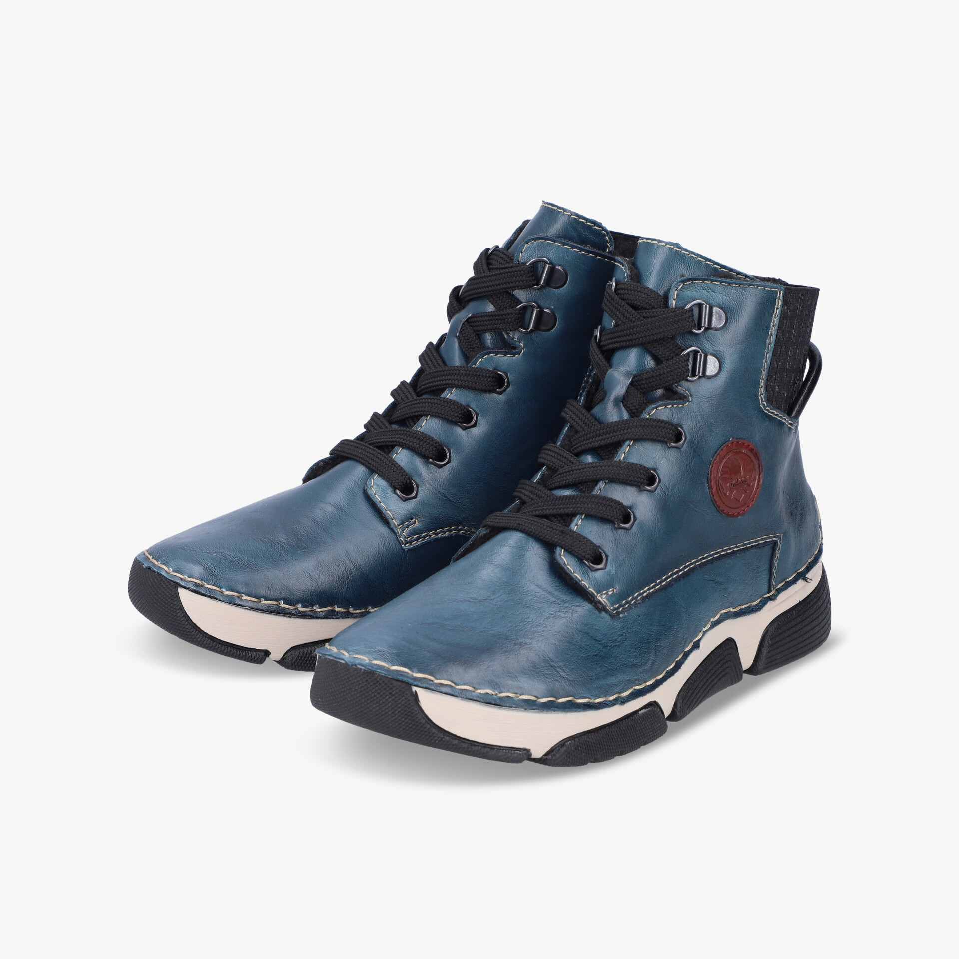 Robuste blaue Sneaker mit moderner Optik, bequemer Passform und flexibler Sohle im Paar schräg vorne fotografiert