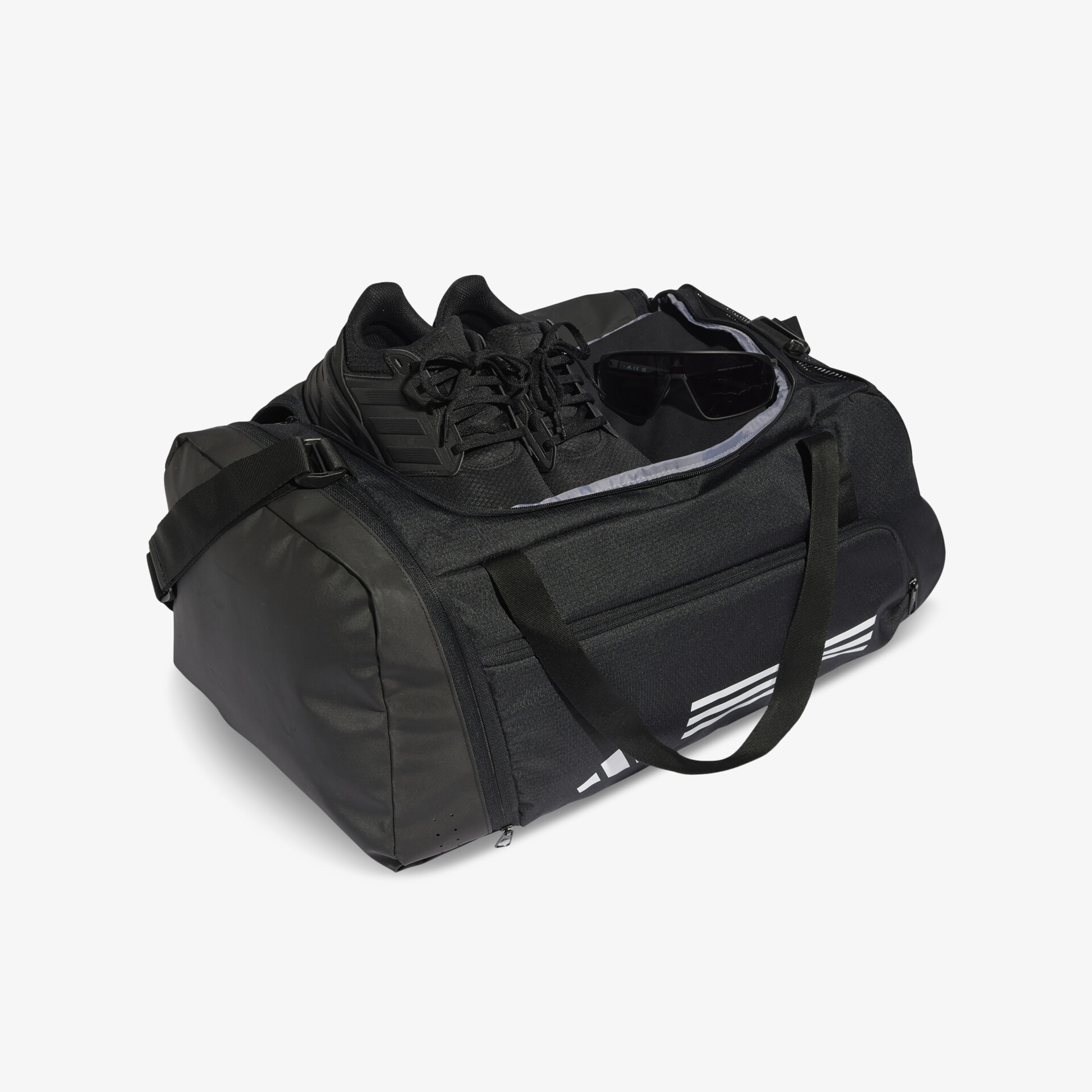 Schwarze Sporttasche mit Reißverschluss, festen Tragegriffen und ausreichend Stauraum für Schuhe und Zubehör