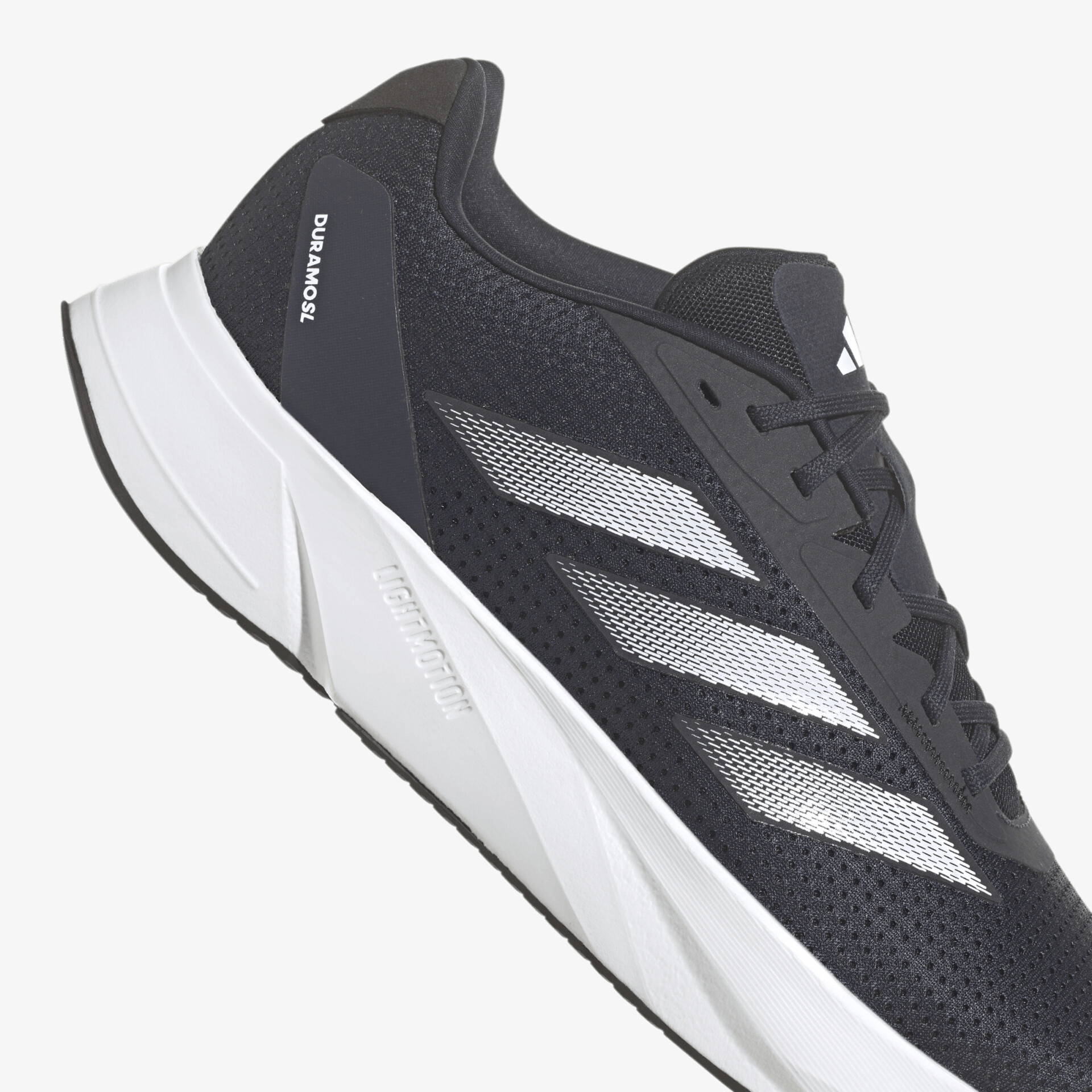 Schwarzer und weißer Sportschuh mit dynamischem Design und optimaler Dämpfung für hohen Tragekomfort.
