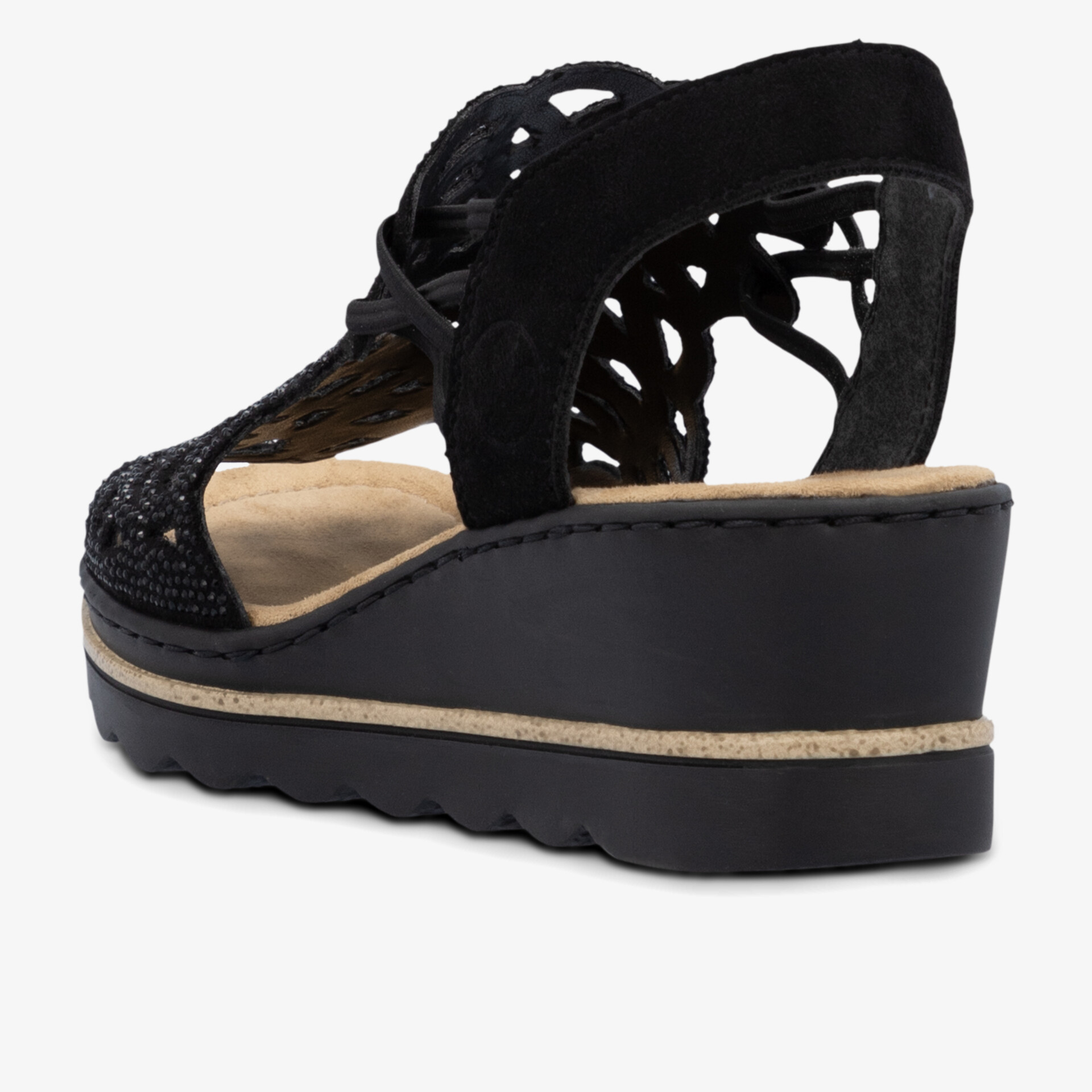 Seitliche Ansicht eines schwarzen Schuhs mit Keilabsatz und offenem Fersenbereich, komfortabel und modisch