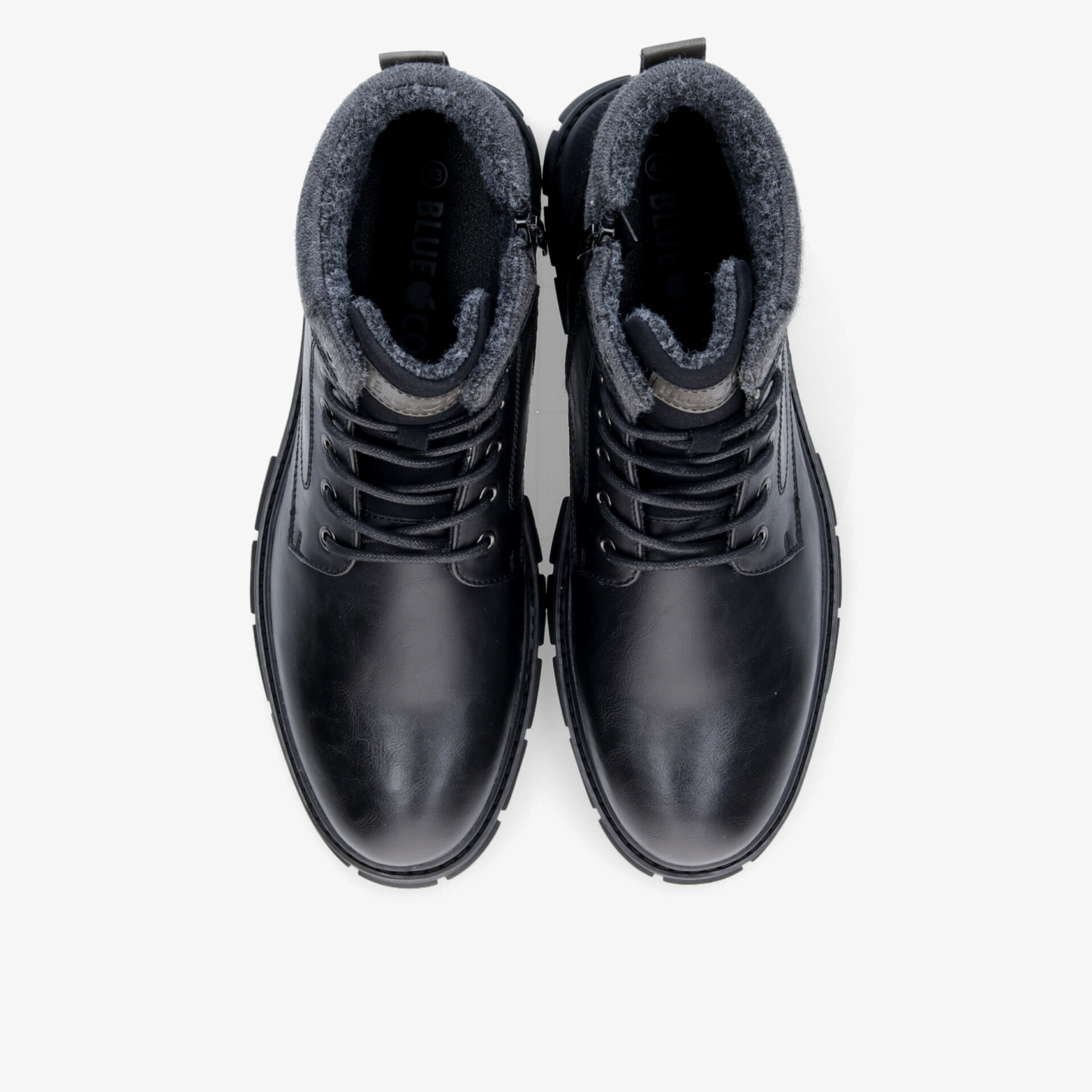 Robuste schwarze Lederstiefel mit warmem Innenfutter und rutschfester Sohle. Perfekt für kalte Temperaturen.