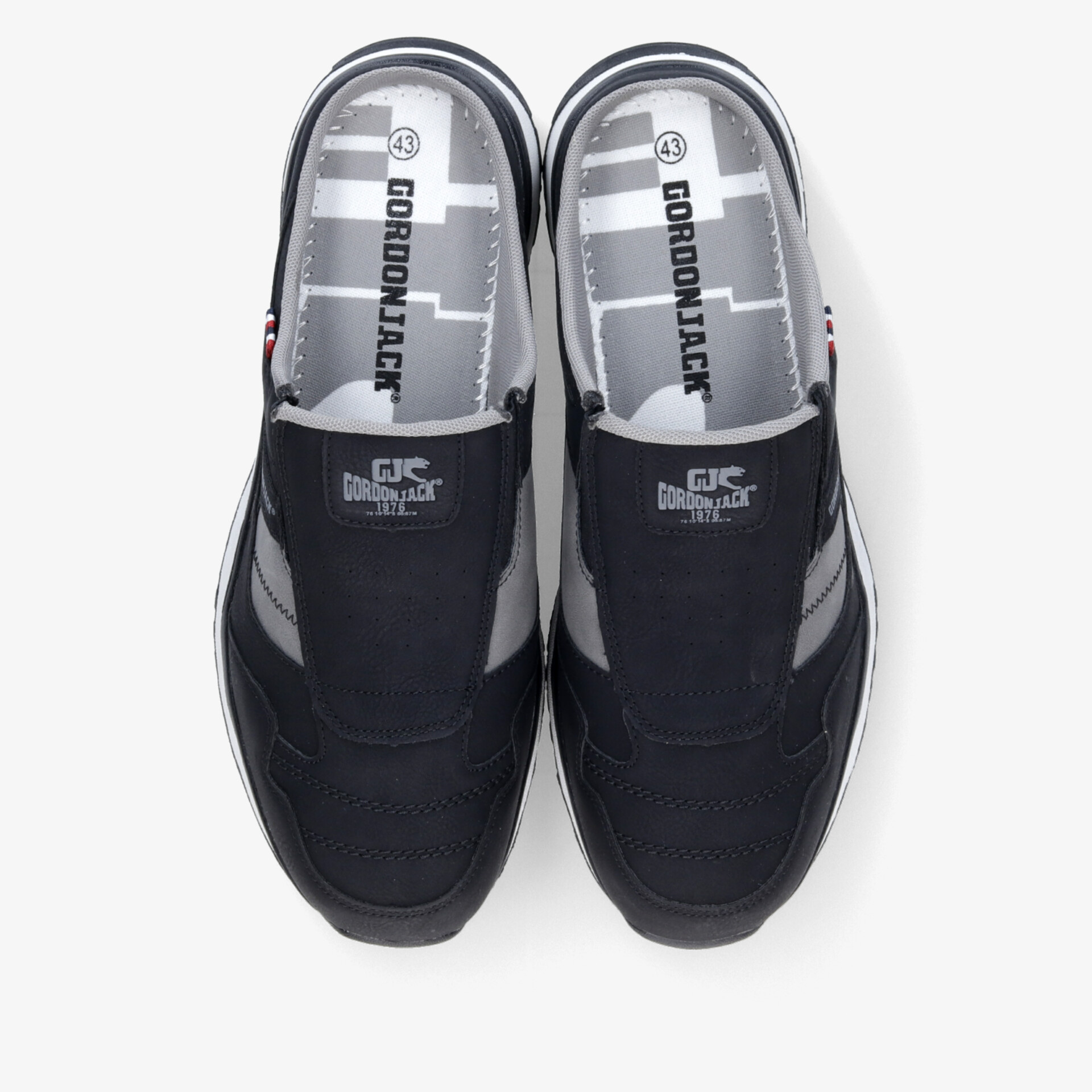 Schwarz-graues Slipper Paar in Draufsicht, bequem und leicht mit rutschfester Sohle und modernem Design