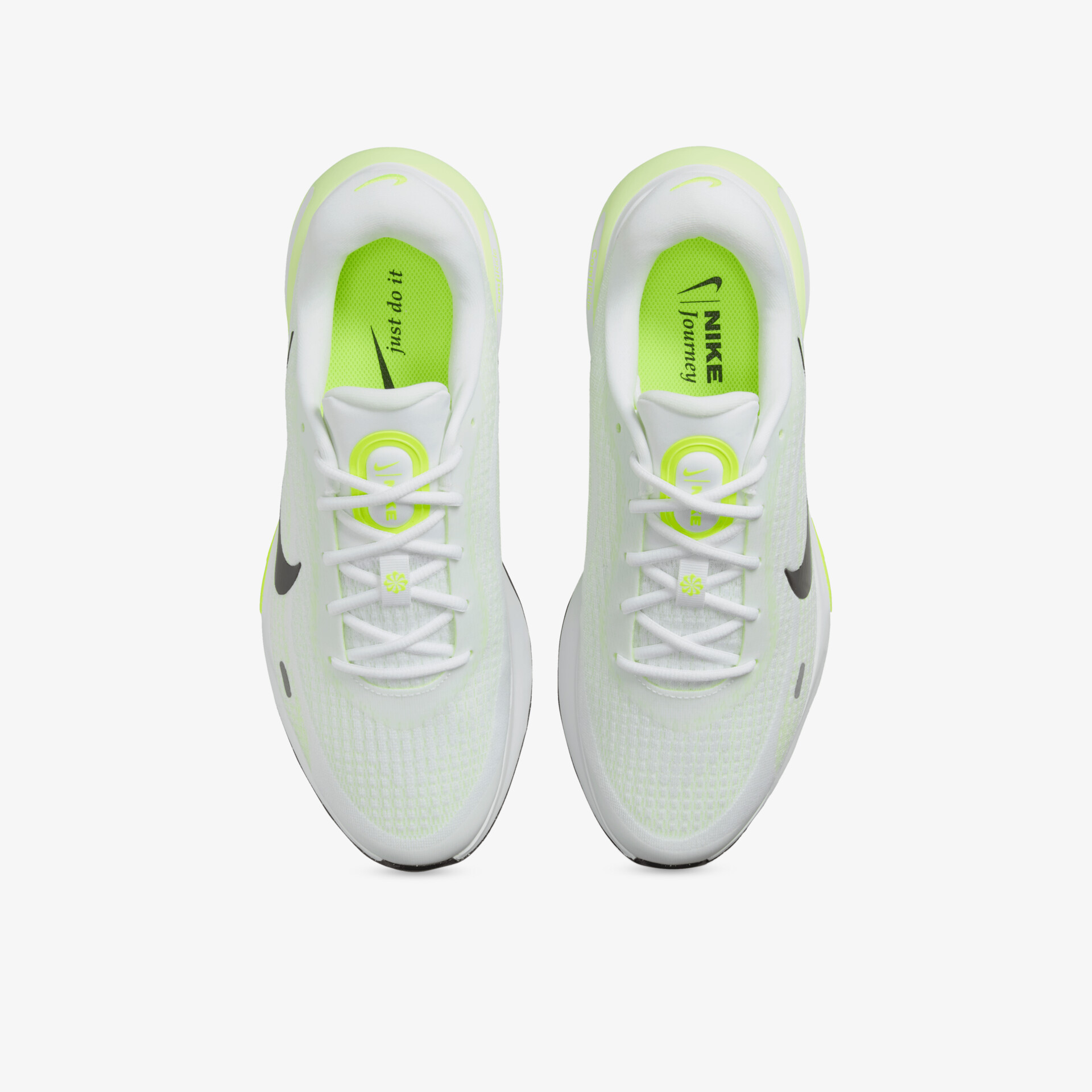 Leichte weiße Sportschuhe mit neonfarbener Innensohle und bequemer Passform, ideal für lässigen Komfort