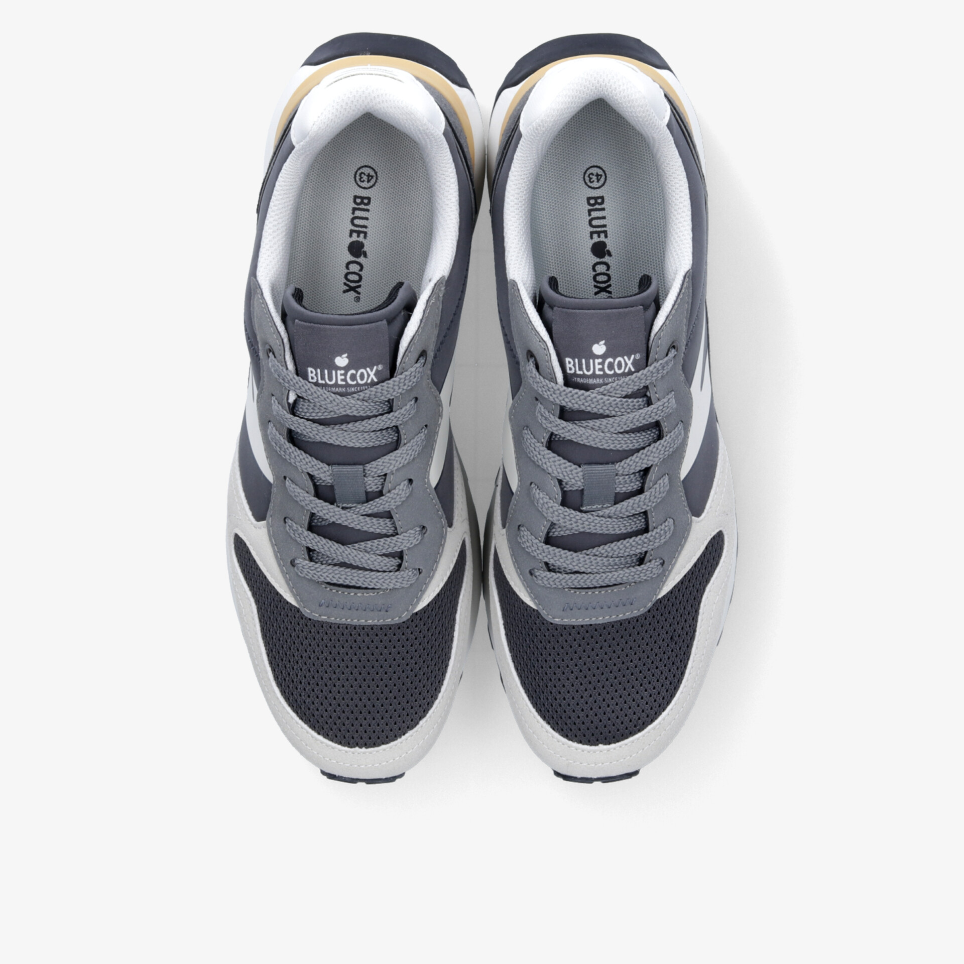 Sportliche graue Sneaker mit atmungsaktivem Material und bequemer Passform, ideal für vielseitigen Einsatz