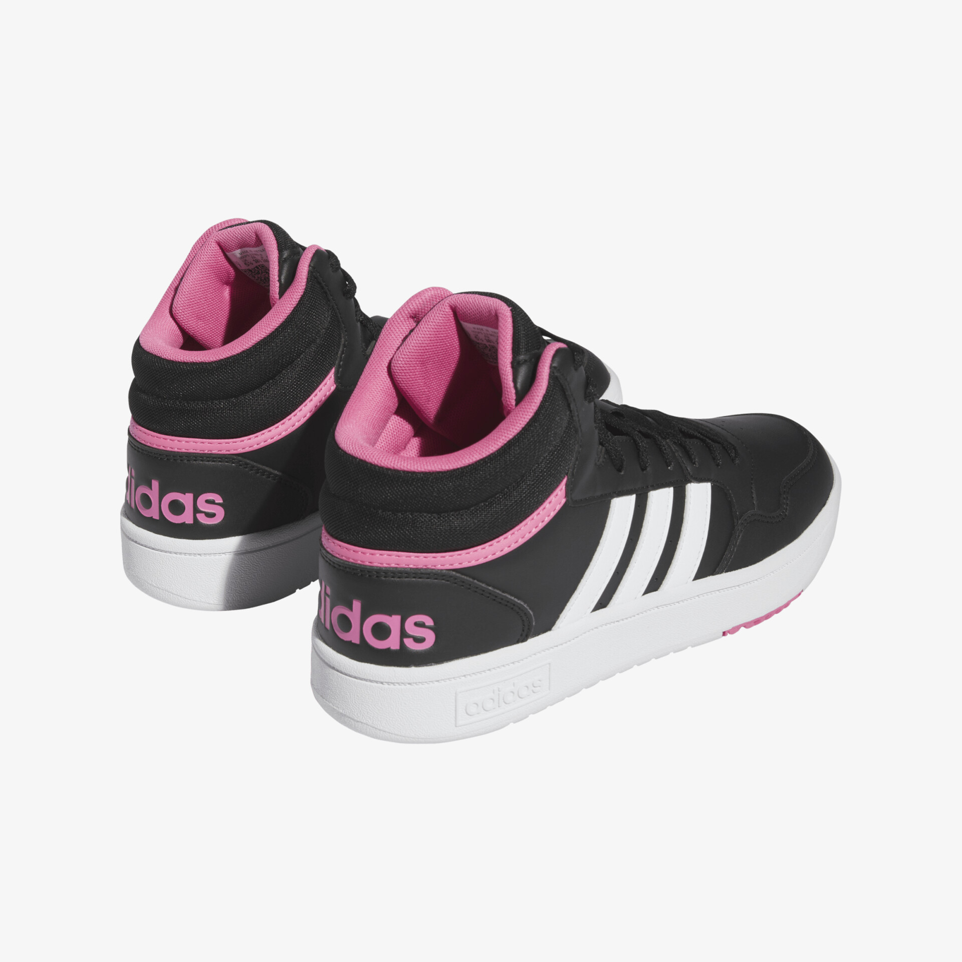 Schwarze Sneaker mit rosa Akzenten und weißer Sohle, sportliches Design mit markanten Streifen.
