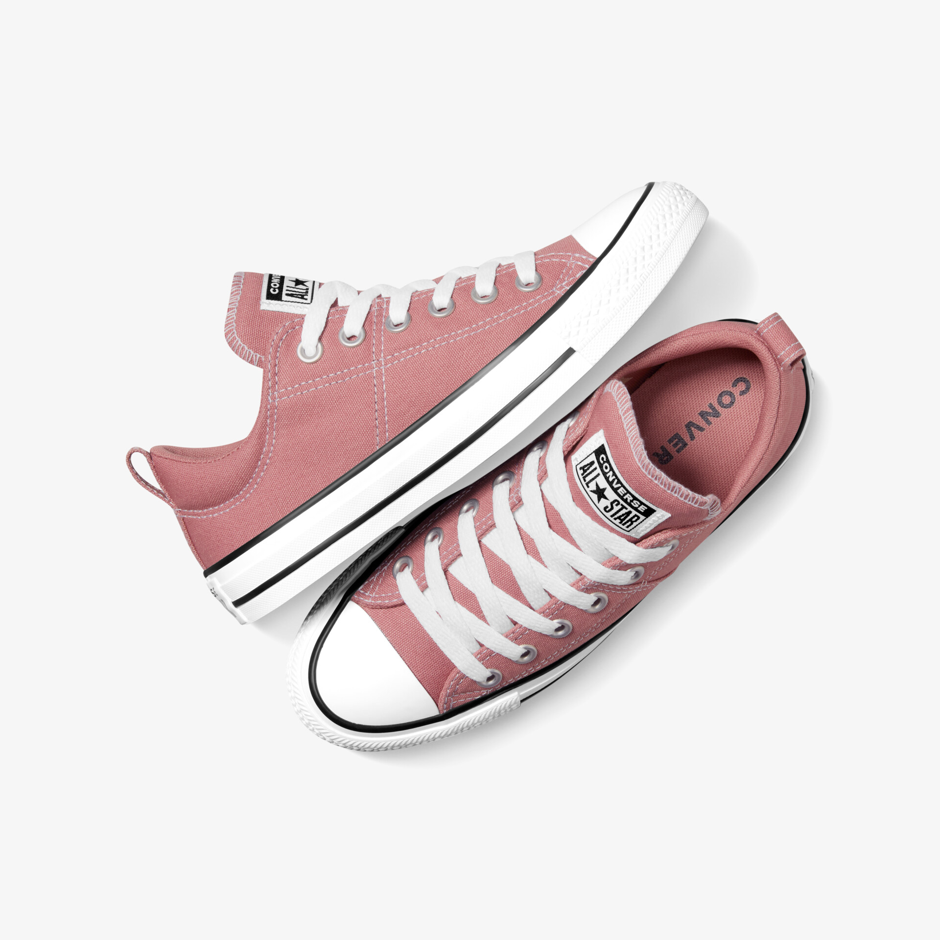 Leichte klassische Sneakers in Rosa mit weißer Gummisohle und schnürung, einfache bequeme Sportschuhe