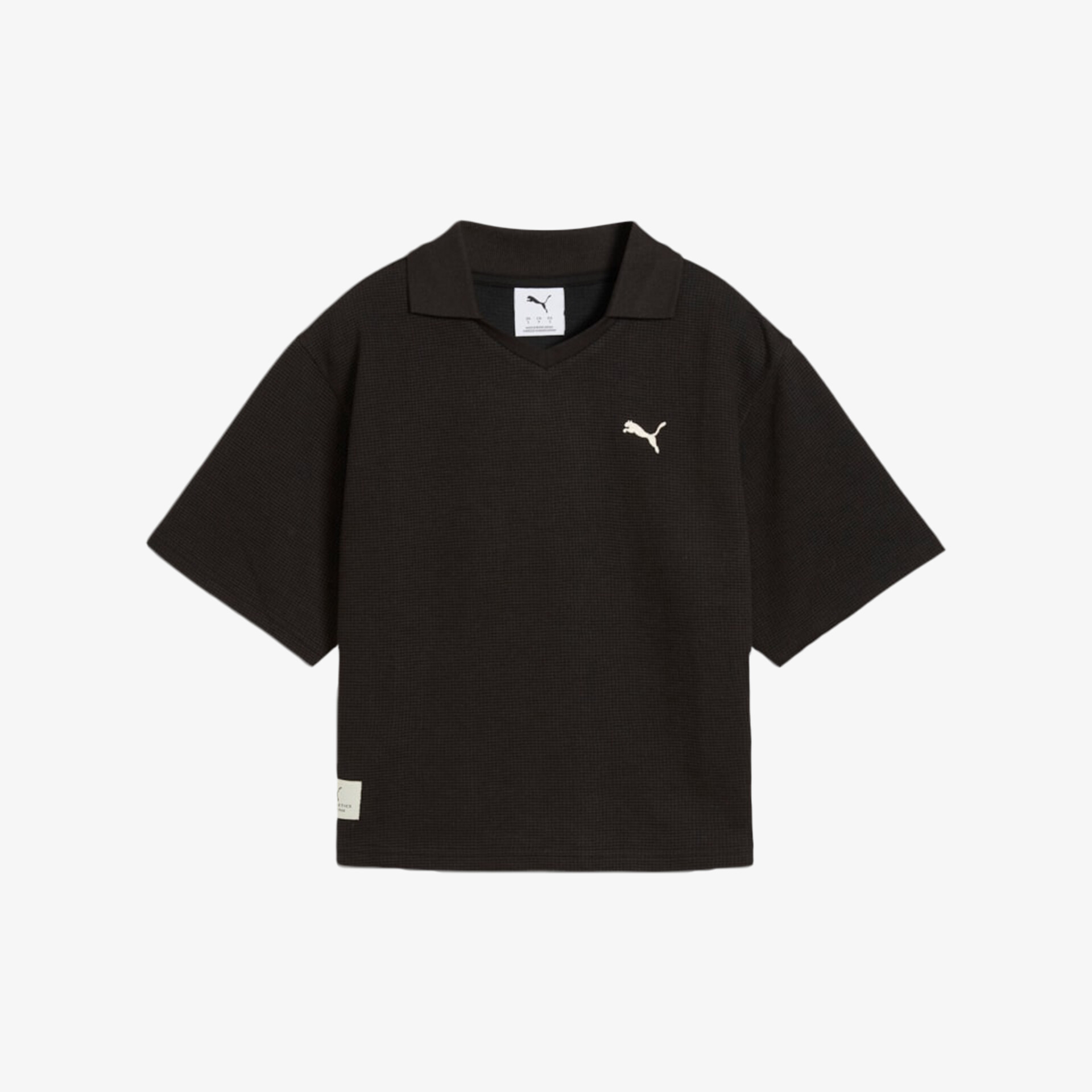 Schwarzes kurzärmliges Poloshirt mit klassischem Schnitt und Puma Logo sportlich und angenehm zu tragen