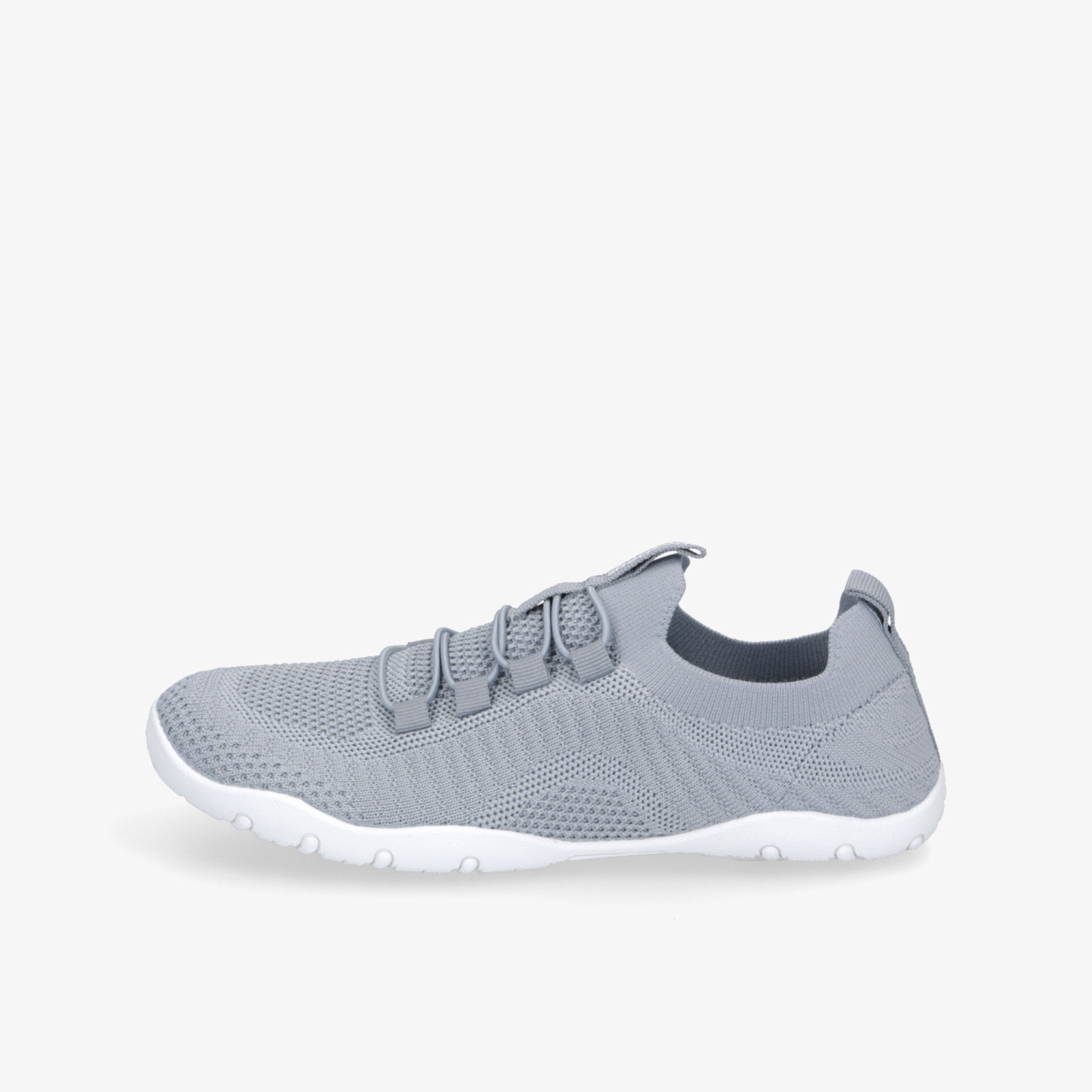 Leichter grauer Sneaker aus atmungsaktivem Material mit flexibler Sohle und modernem, komfortablem Design seitlich