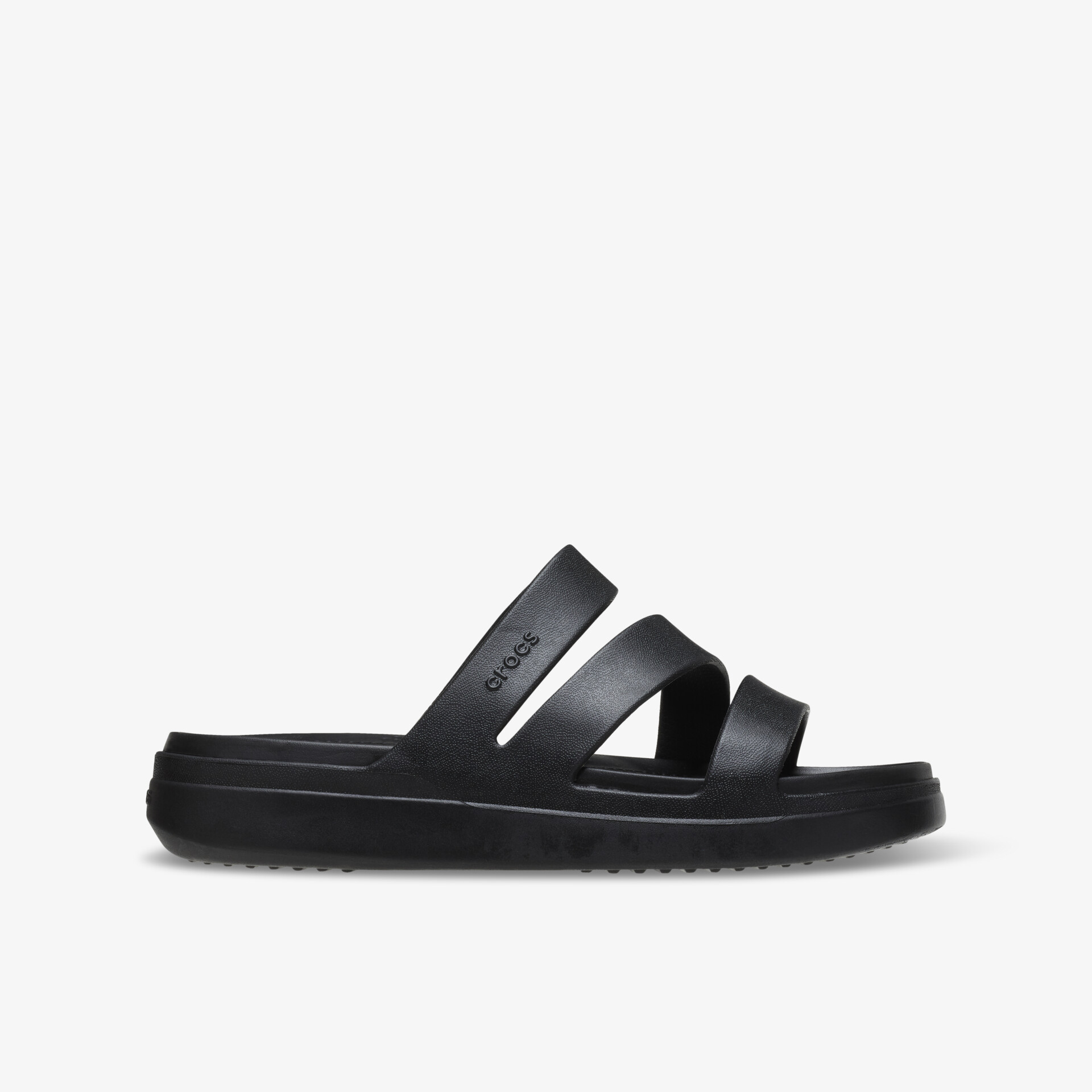 Schwarze bequeme Sandale mit rutschfester Sohle und offenem Design, seitliche Ansicht